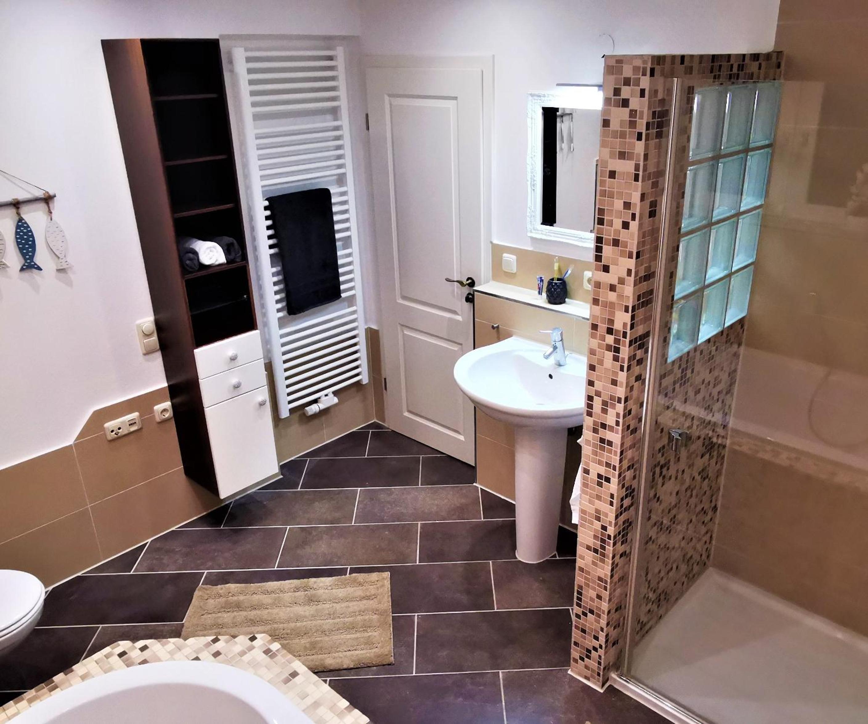Three-Bedroom Apartment - Photo 10
