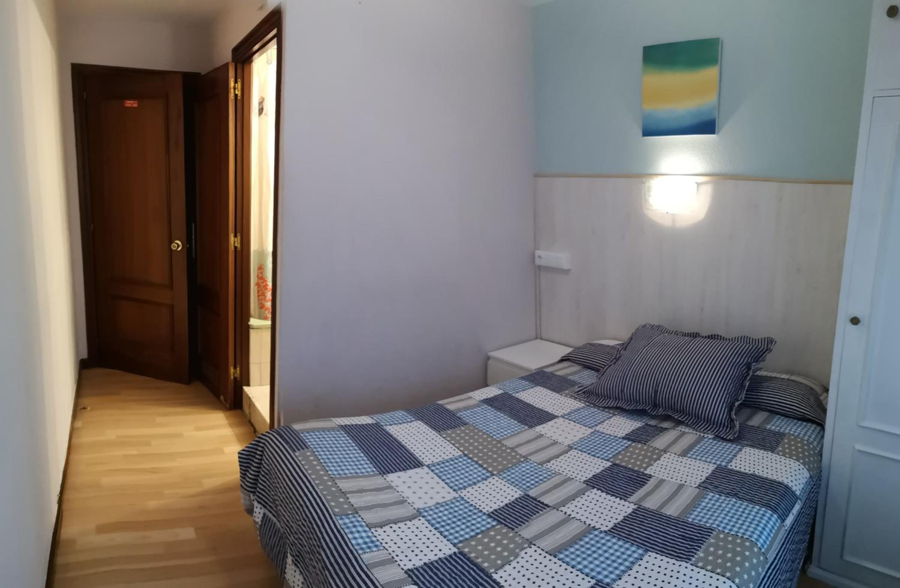 Habitación doble con baño compartido
