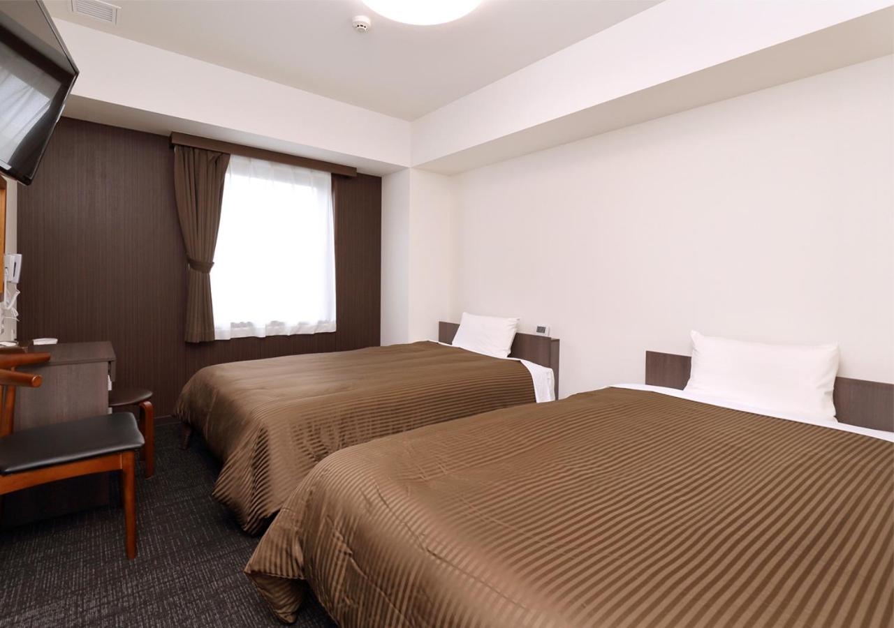 Twin Room - Non-Smoking - Photo 1