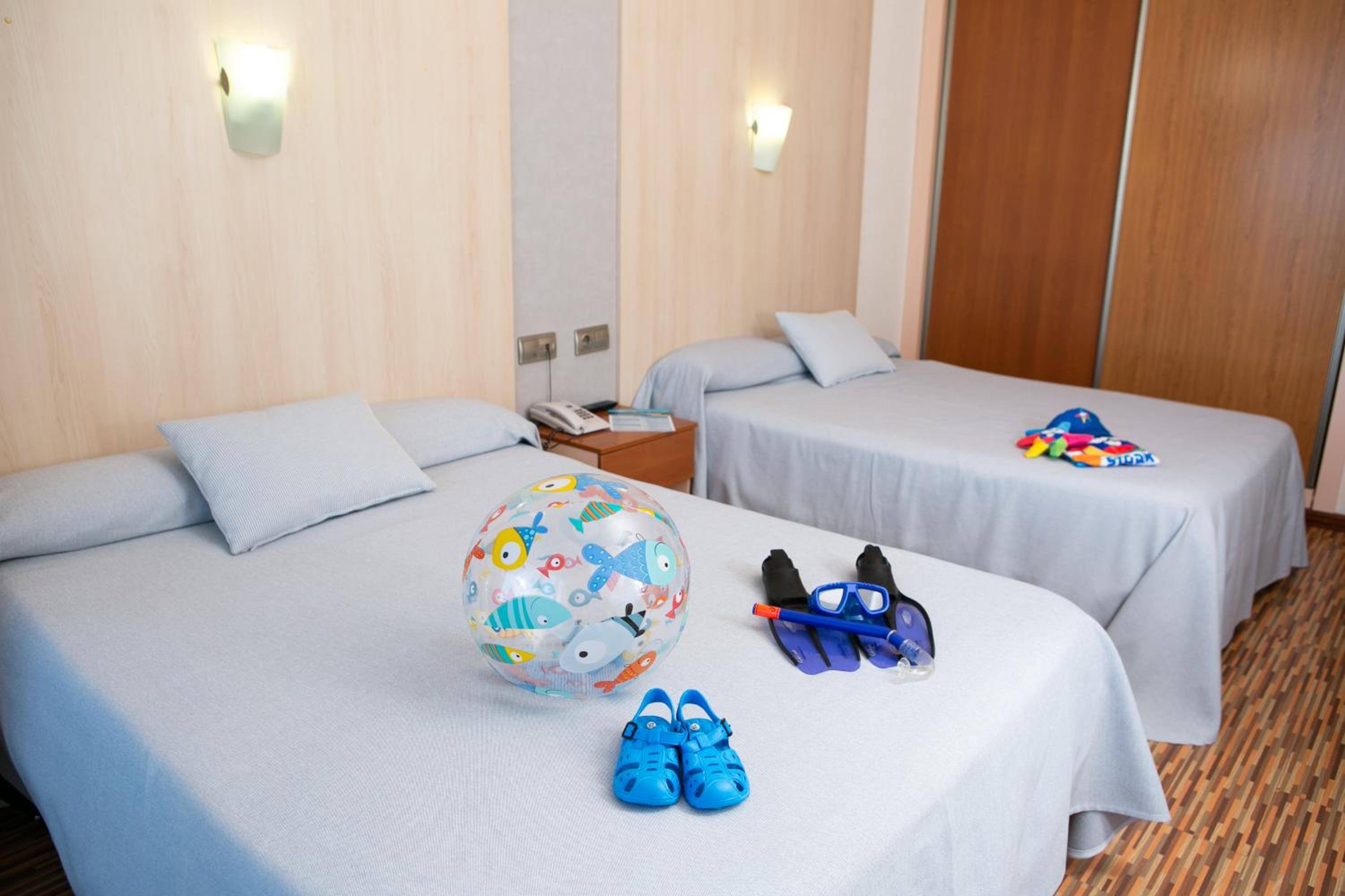 Quadruple Room with Sea View (2 Adults + 2 Children)