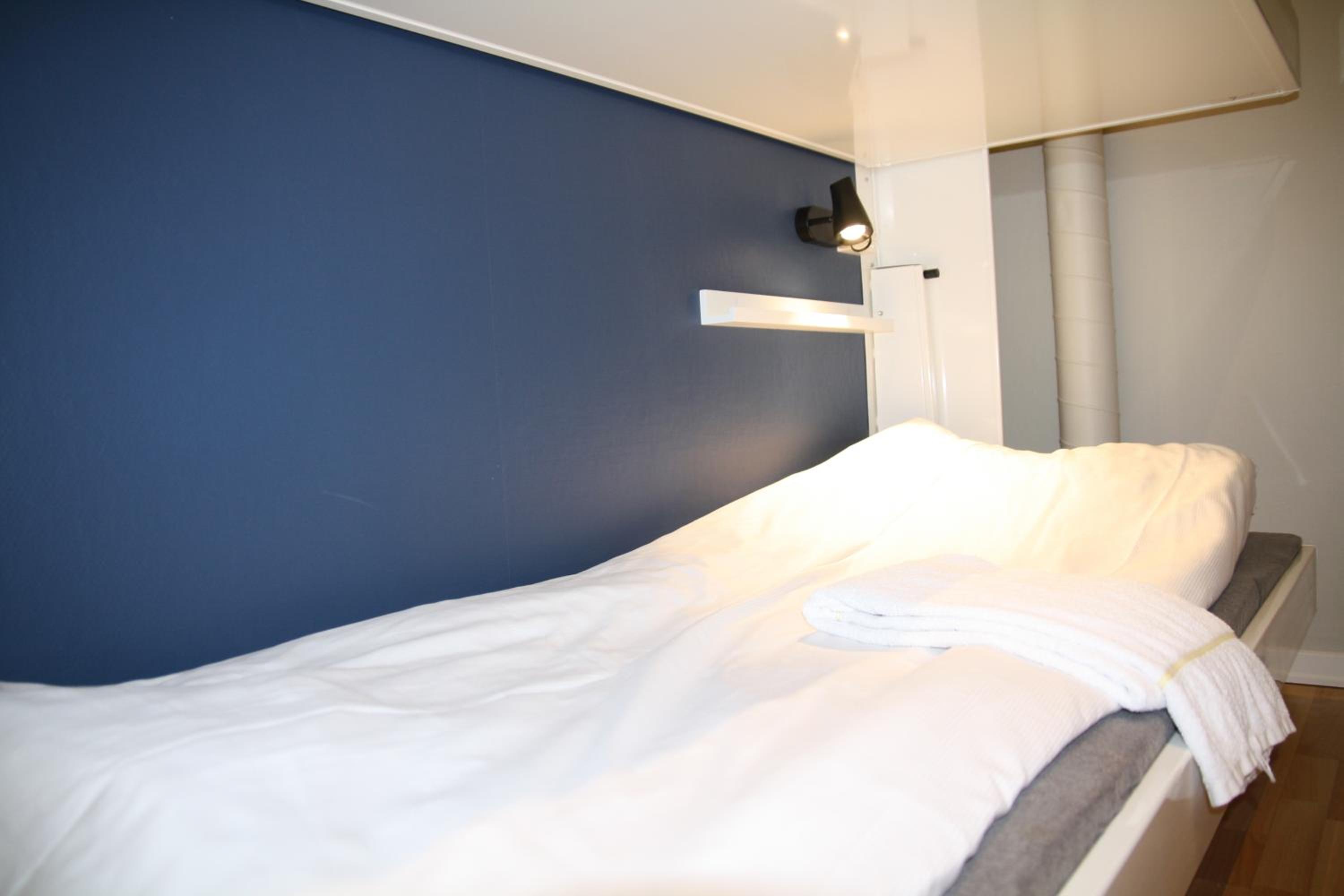 Economy Triple Room with Shared Bathroom photo 2