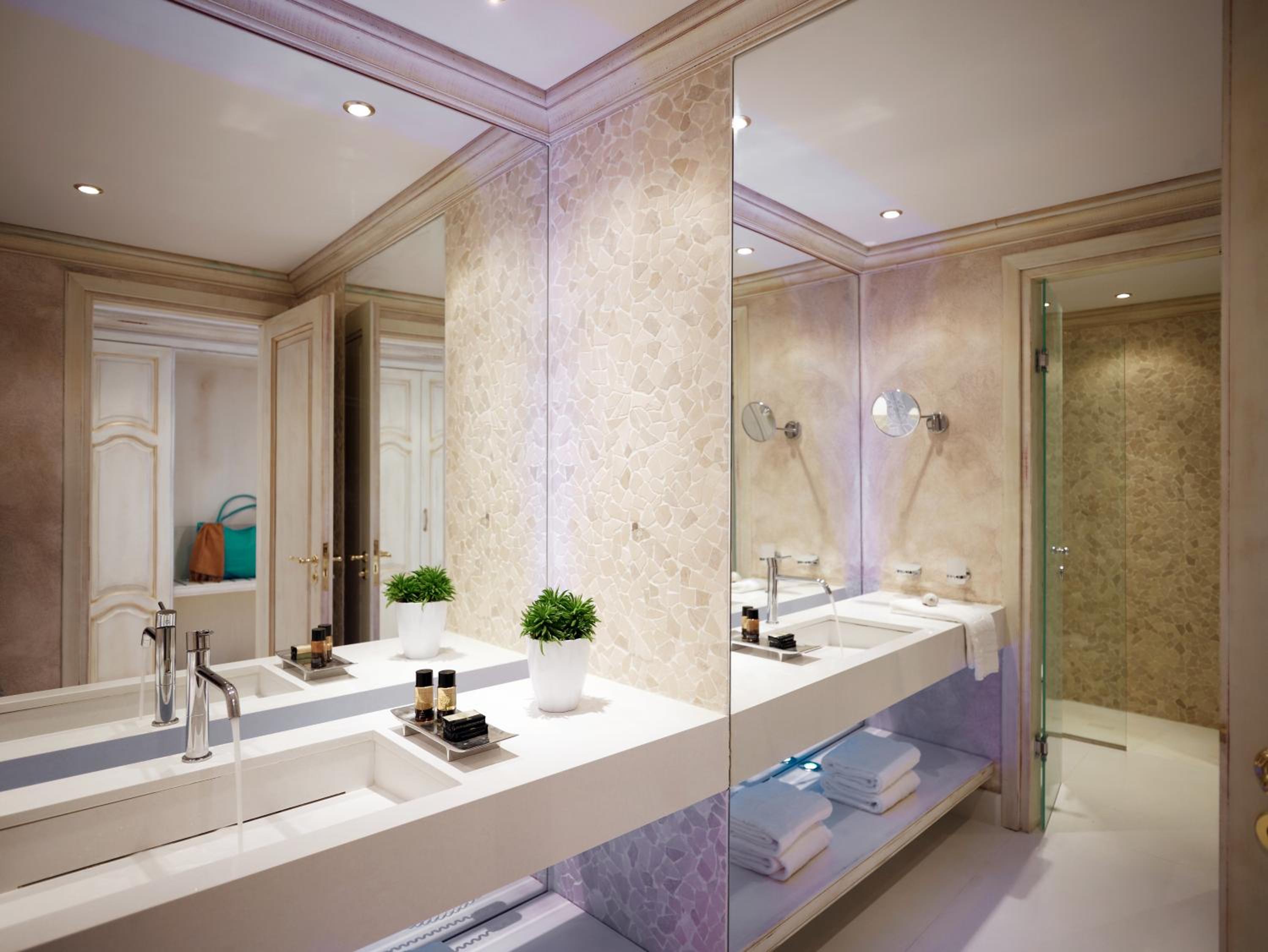 Experience luxury in our serene spa-like bathroom.