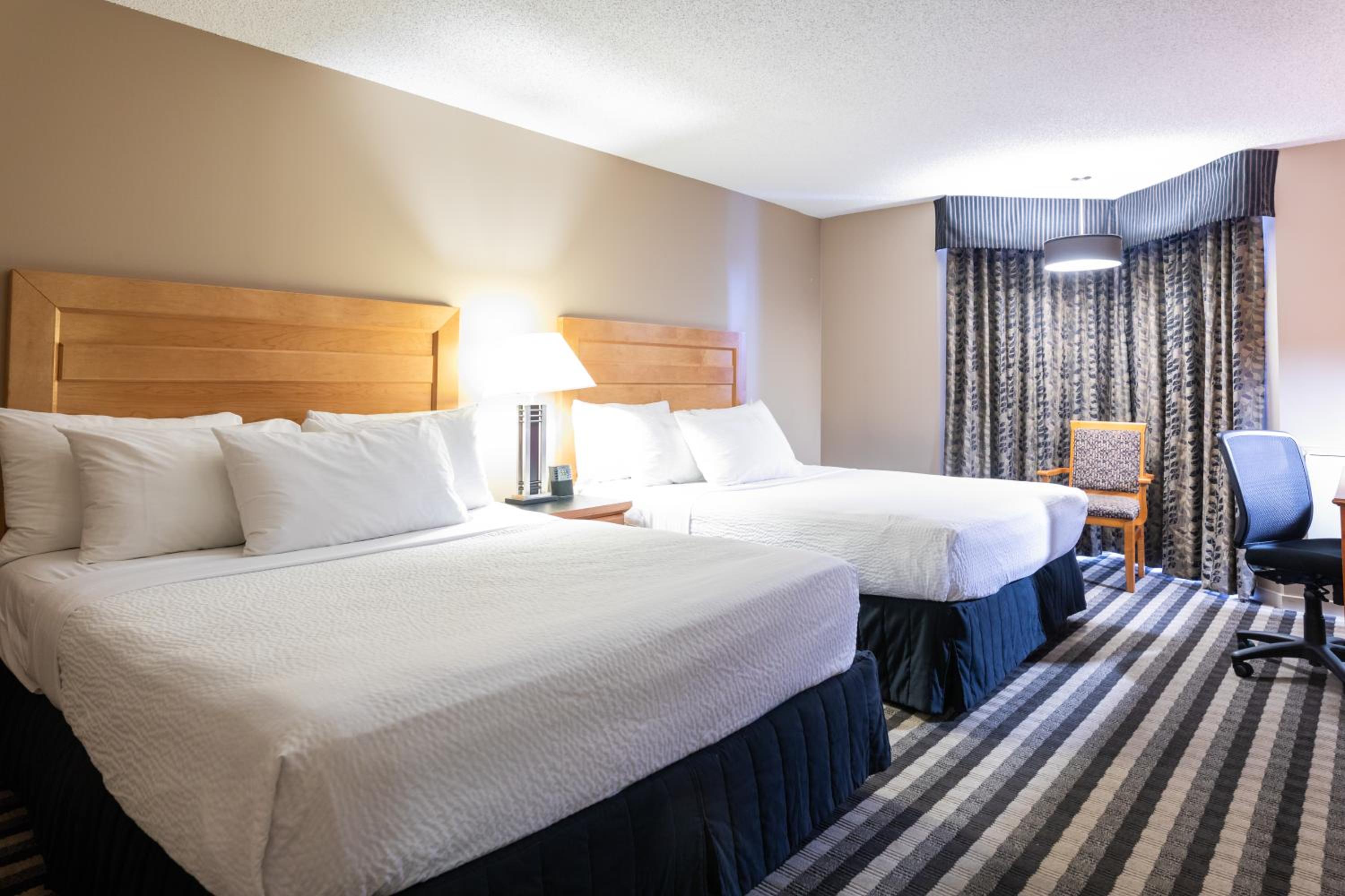 Deluxe Queen Room with Two Queen Beds - Non-Smoking - Photo 1