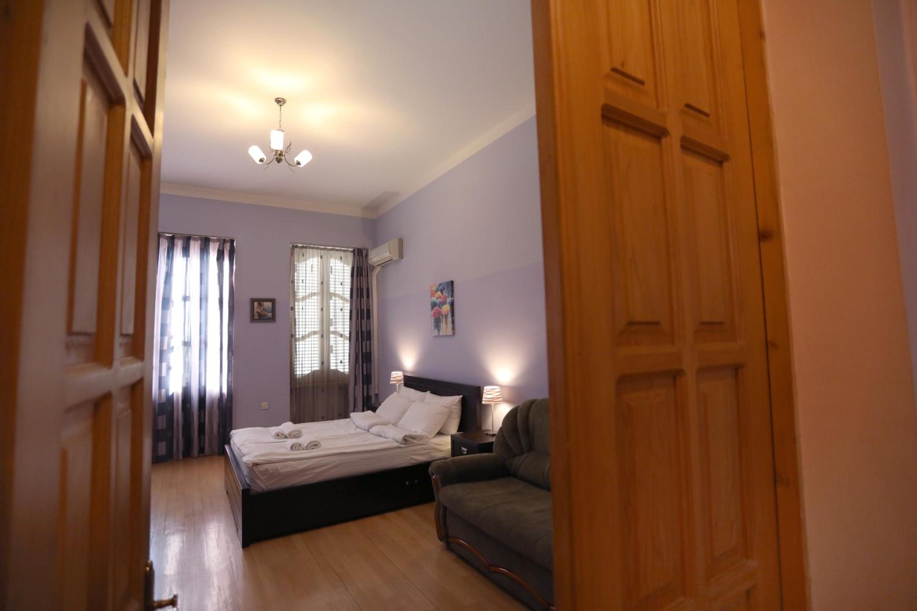 Three-Bedroom Apartment - Photo 2