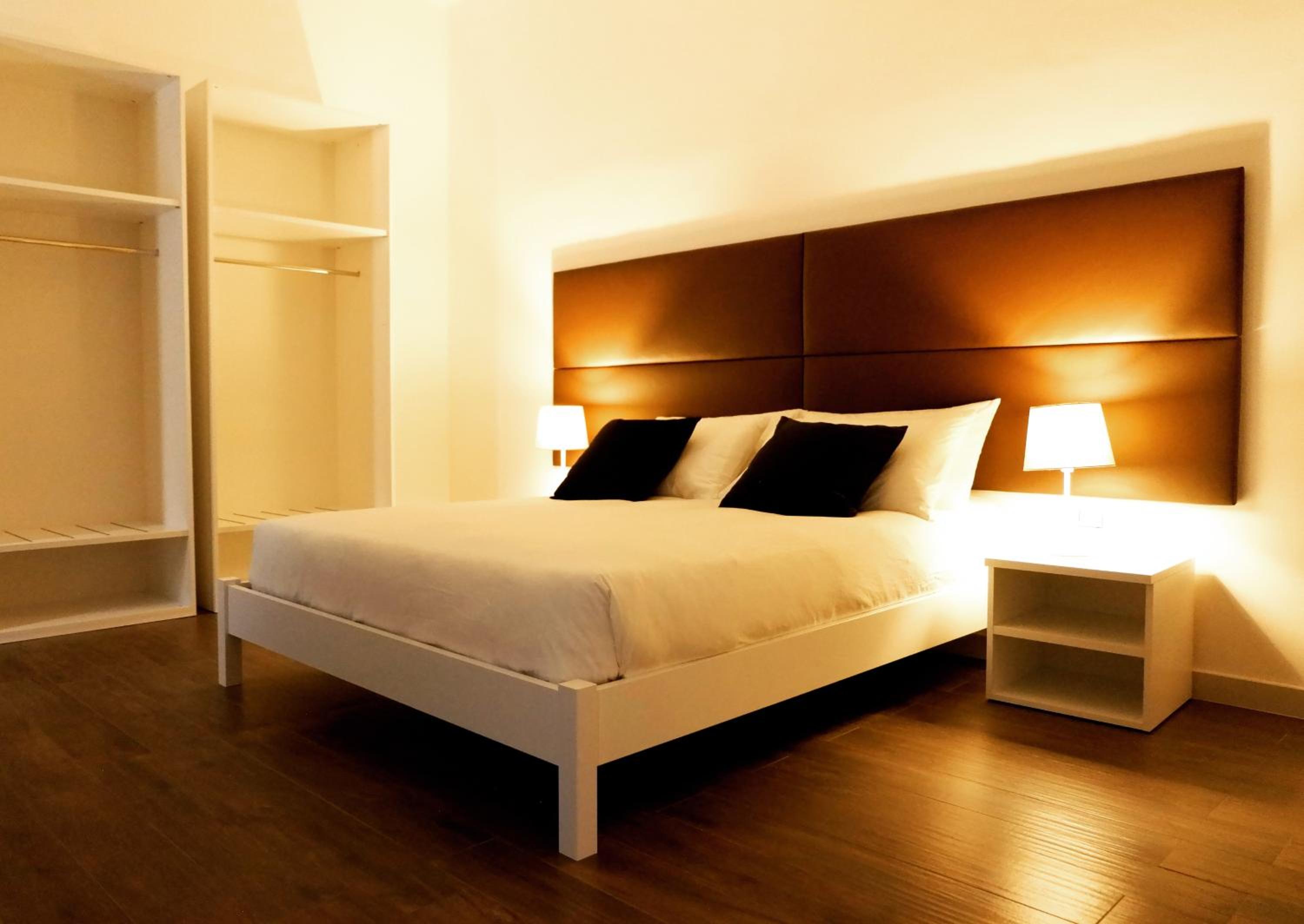 Deluxe Quadruple Room - Photo 17