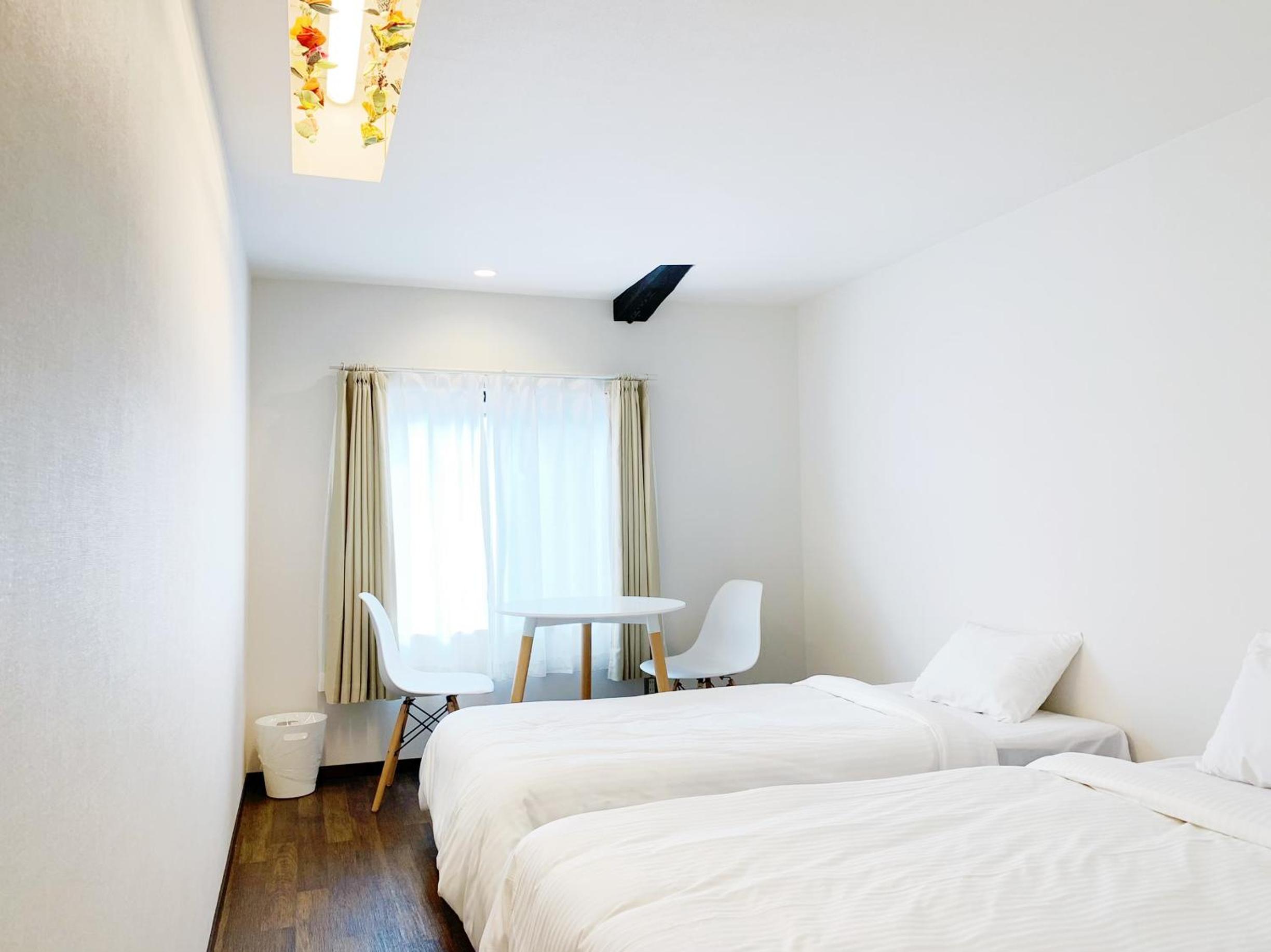 Economy Triple Room - Photo 2