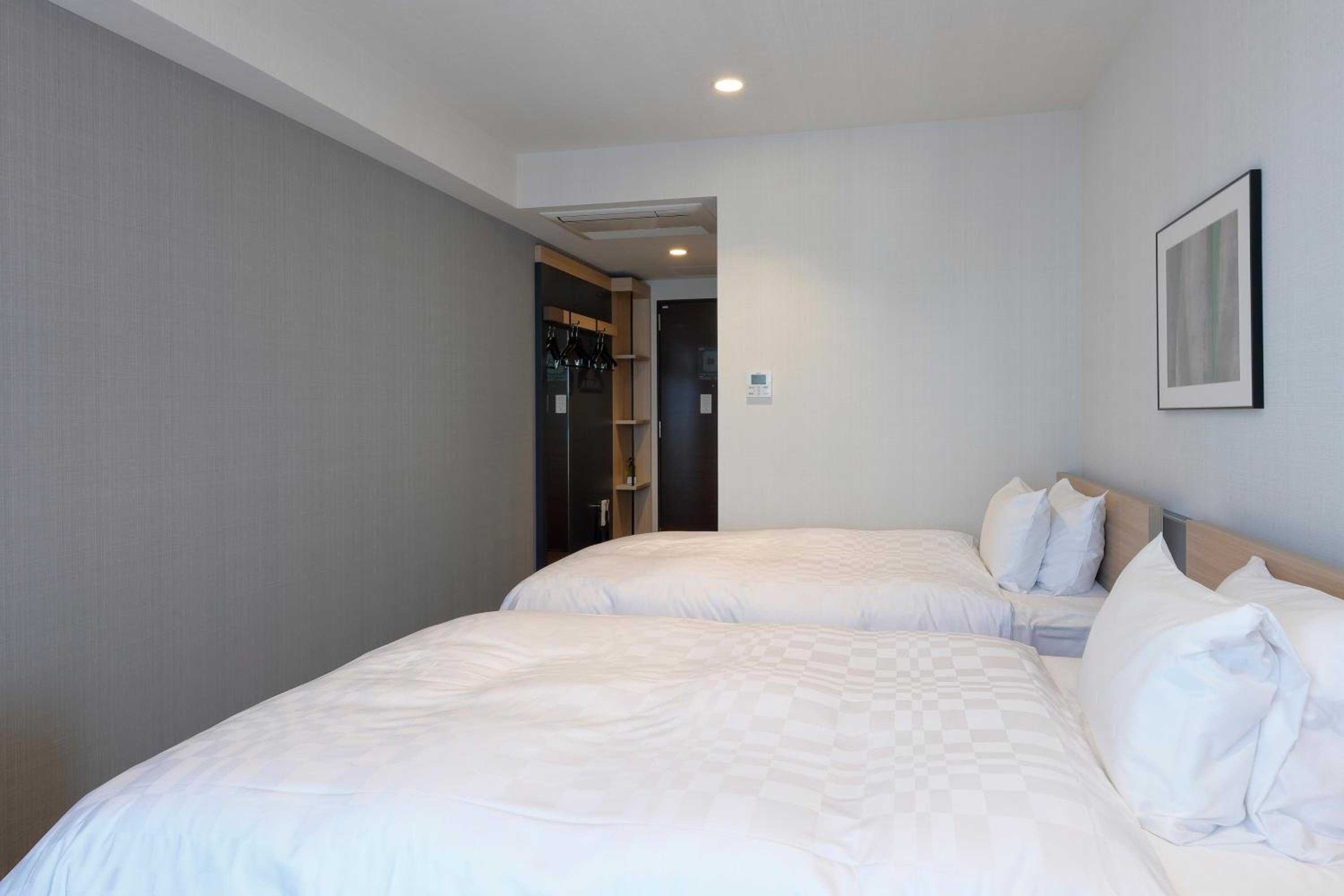 Twin Room - Non-Smoking photo 1