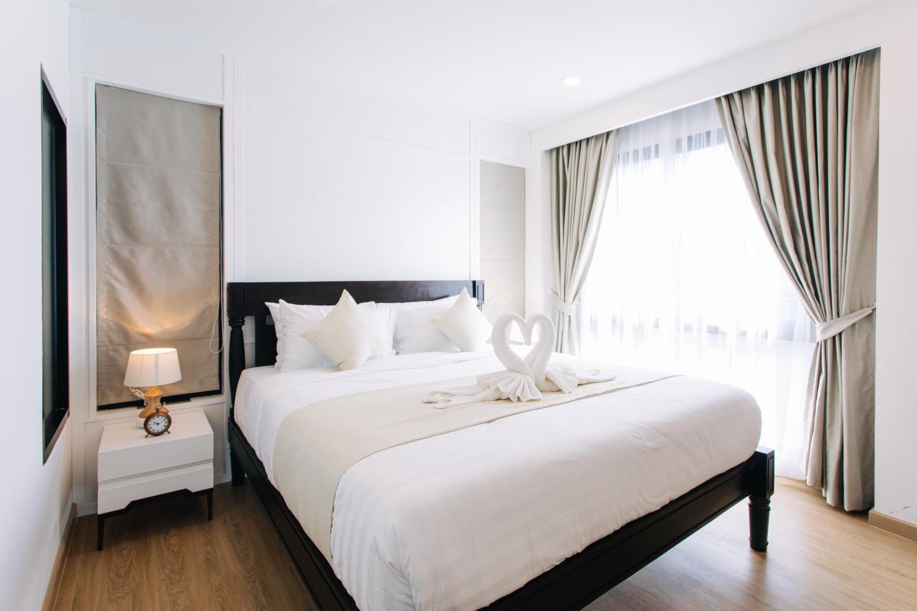 Deluxe Quadruple Room - Photo 8