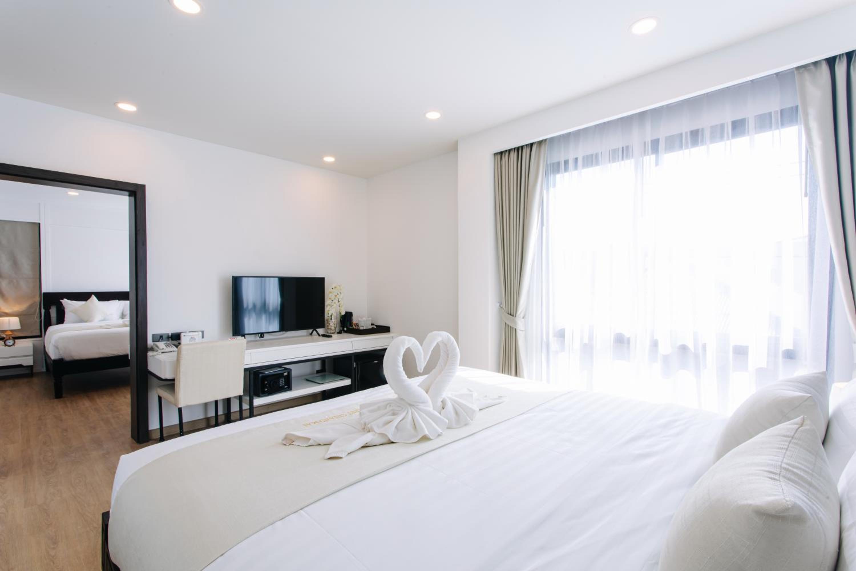 Deluxe Quadruple Room - Photo 4