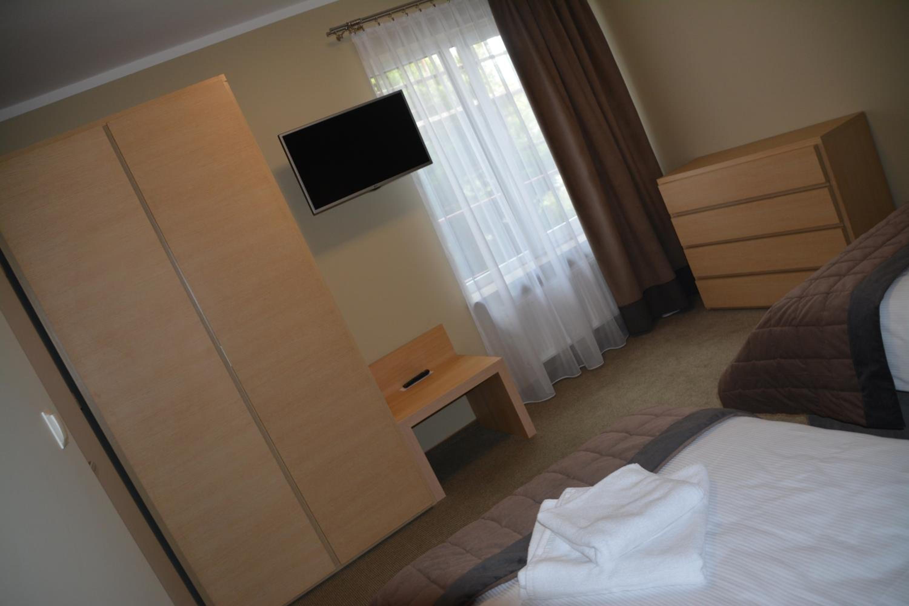 Three-Bedroom Apartment - Photo 2
