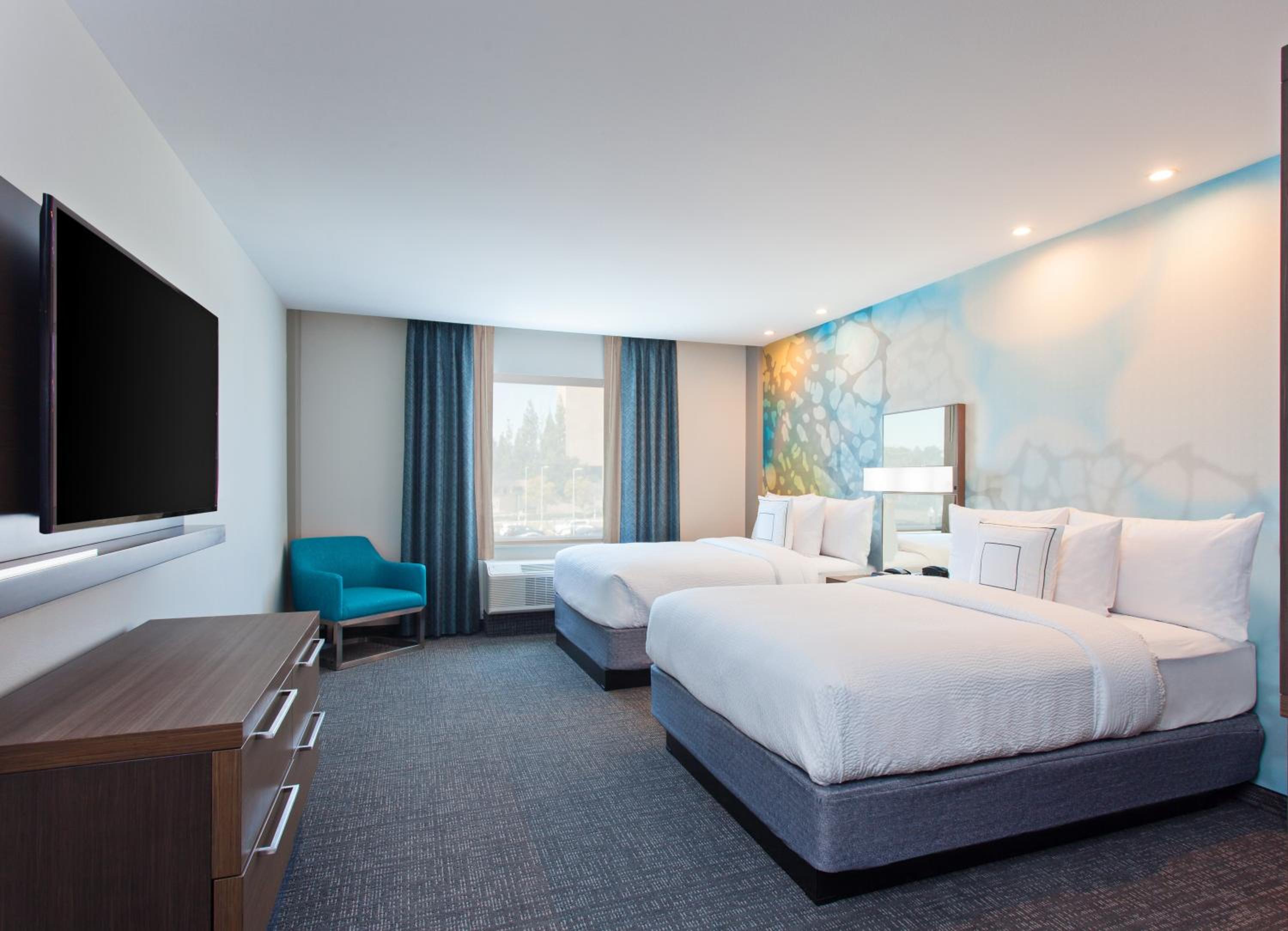 Queen Room with Two Queen Beds - Hearing Accessible photo 1
