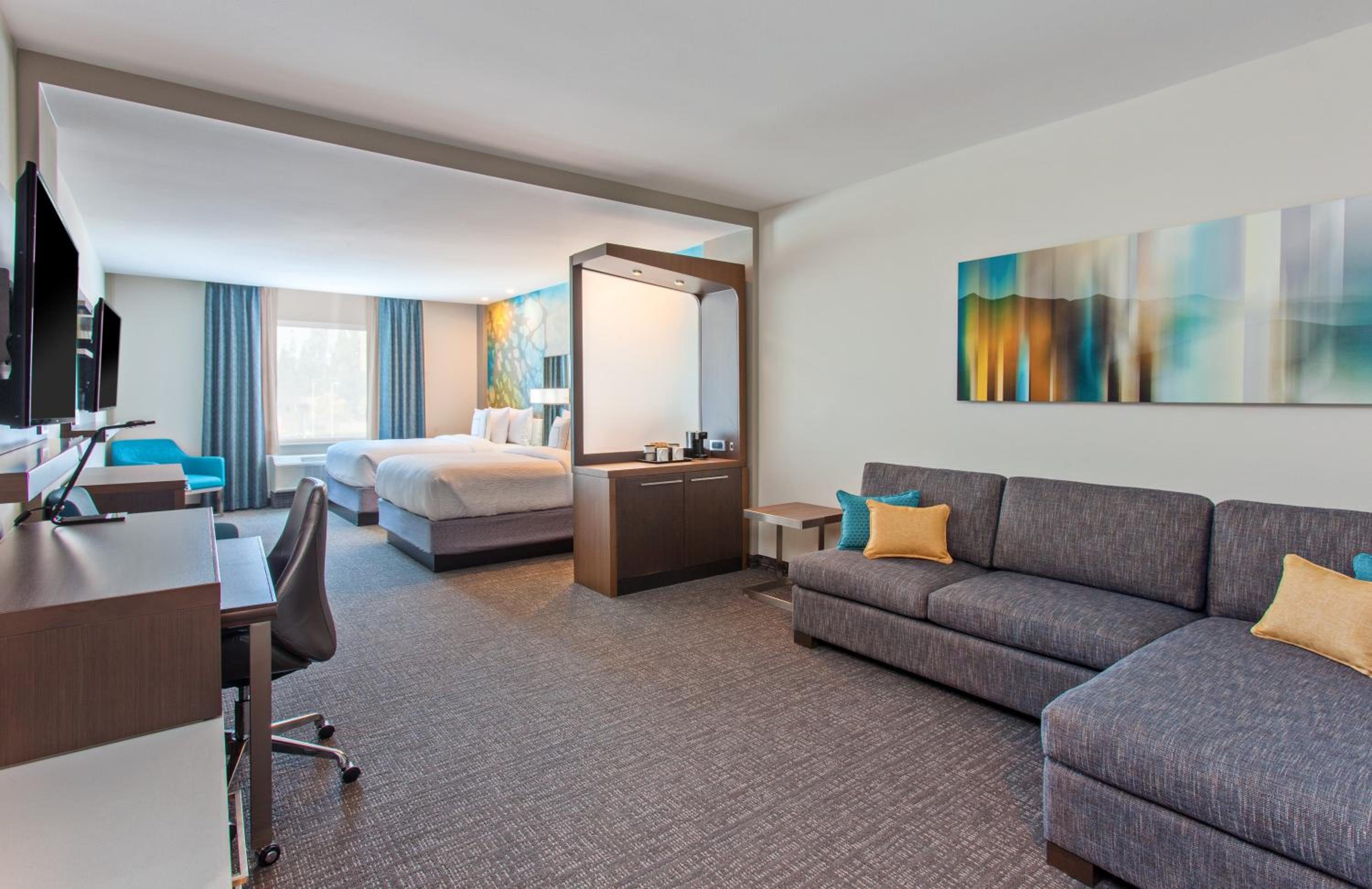 Queen Room with Two Queen Beds and Sofa Bed - Hearing Accessible photo 1