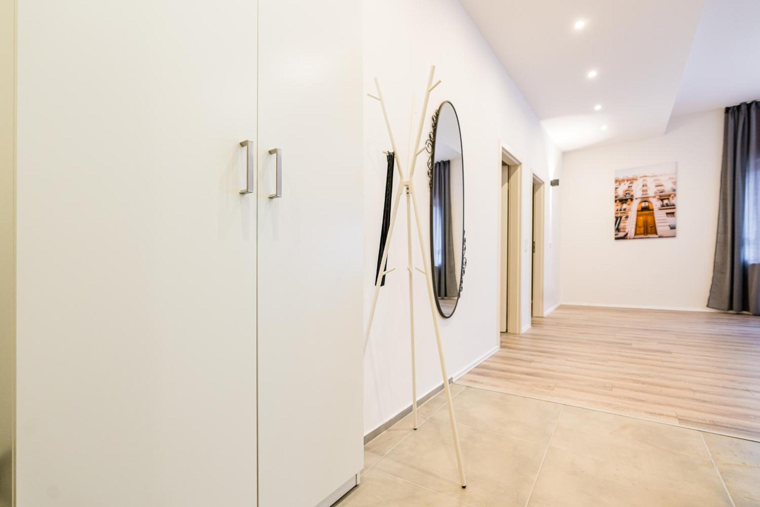 Three-Bedroom Apartment with Balcony photo 2