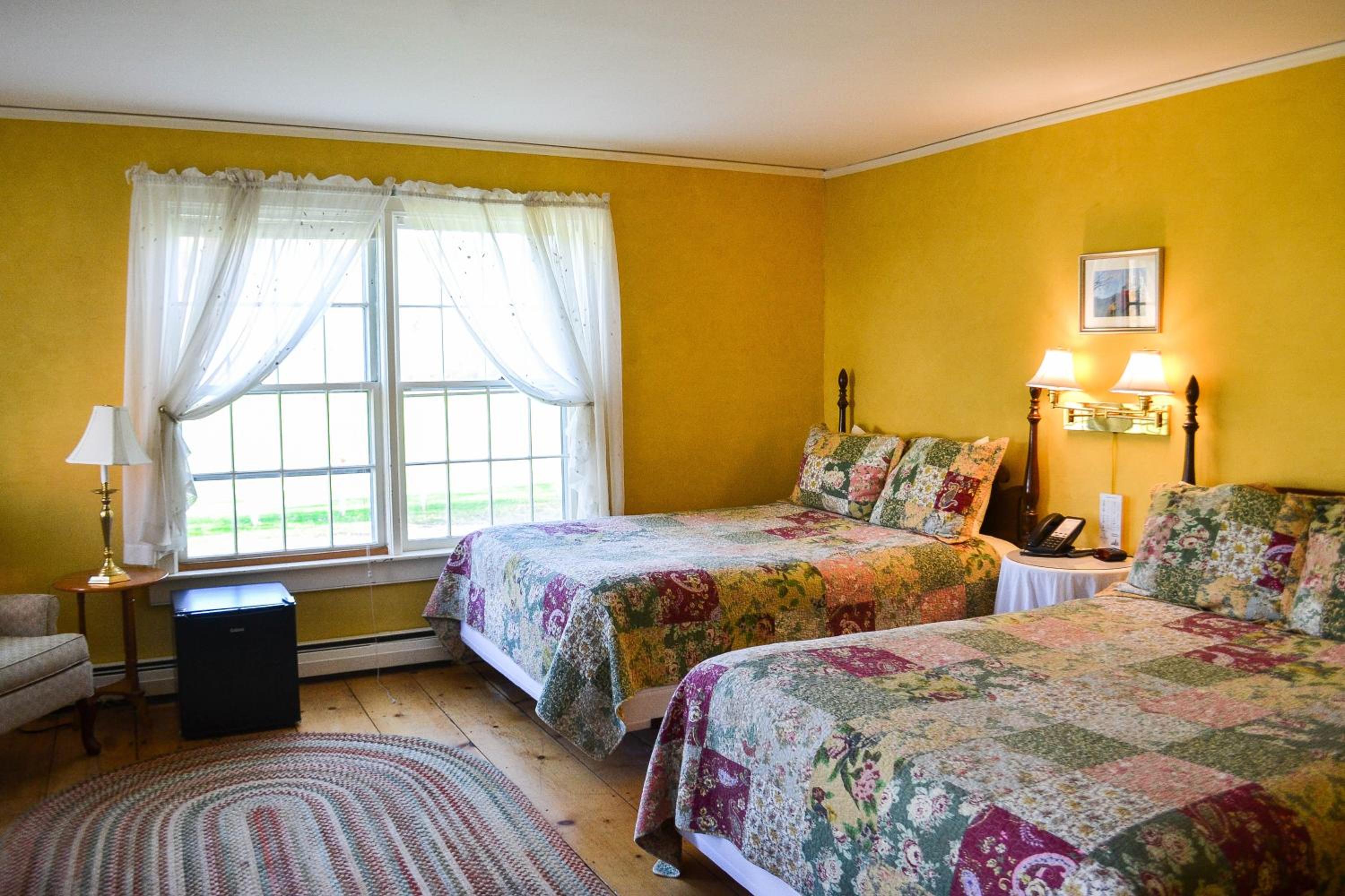 Deluxe Queen Room with Two Queen Beds - Photo 1