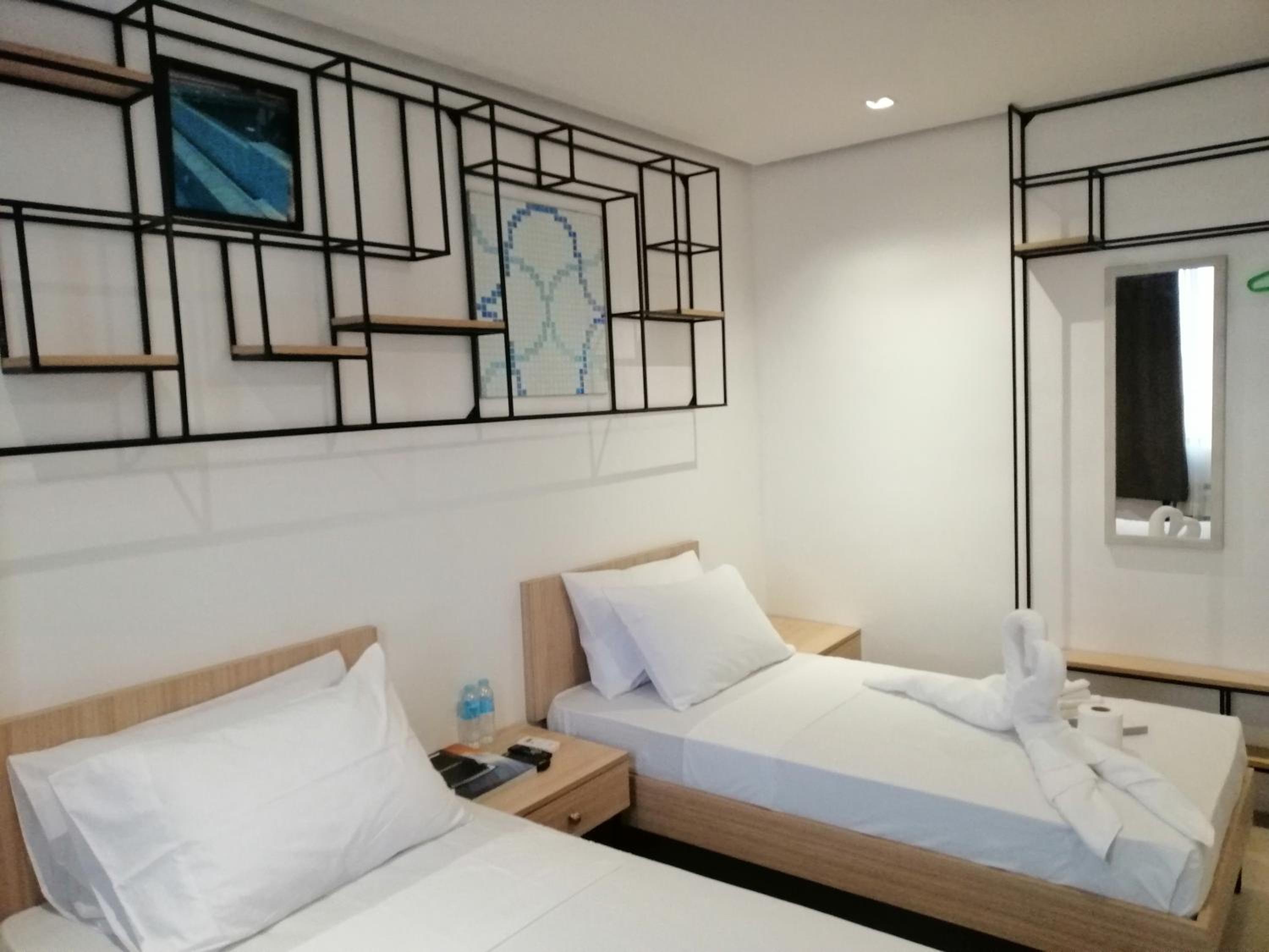 Standard Twin Room - Photo 7