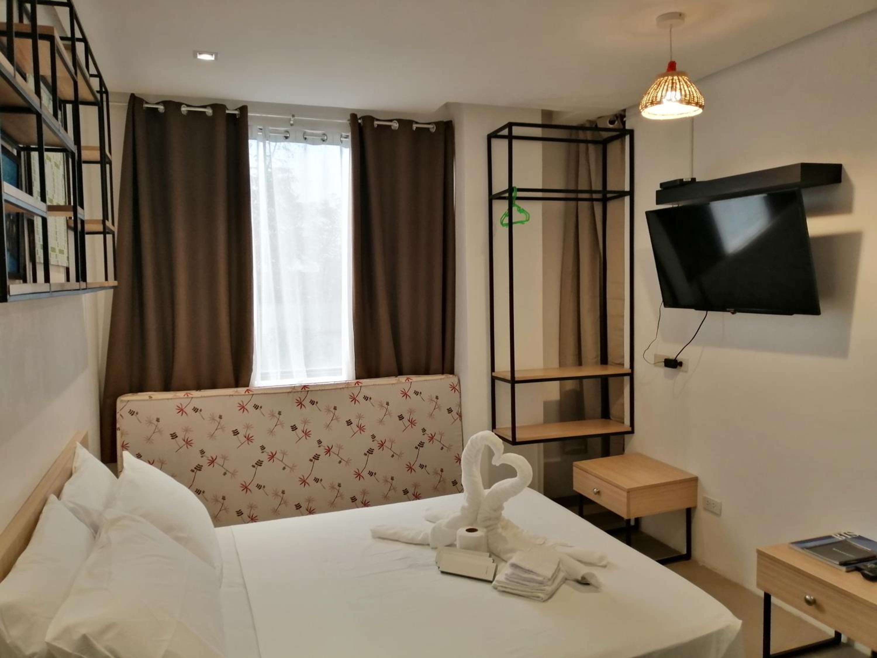 Deluxe Triple Room - Photo 7