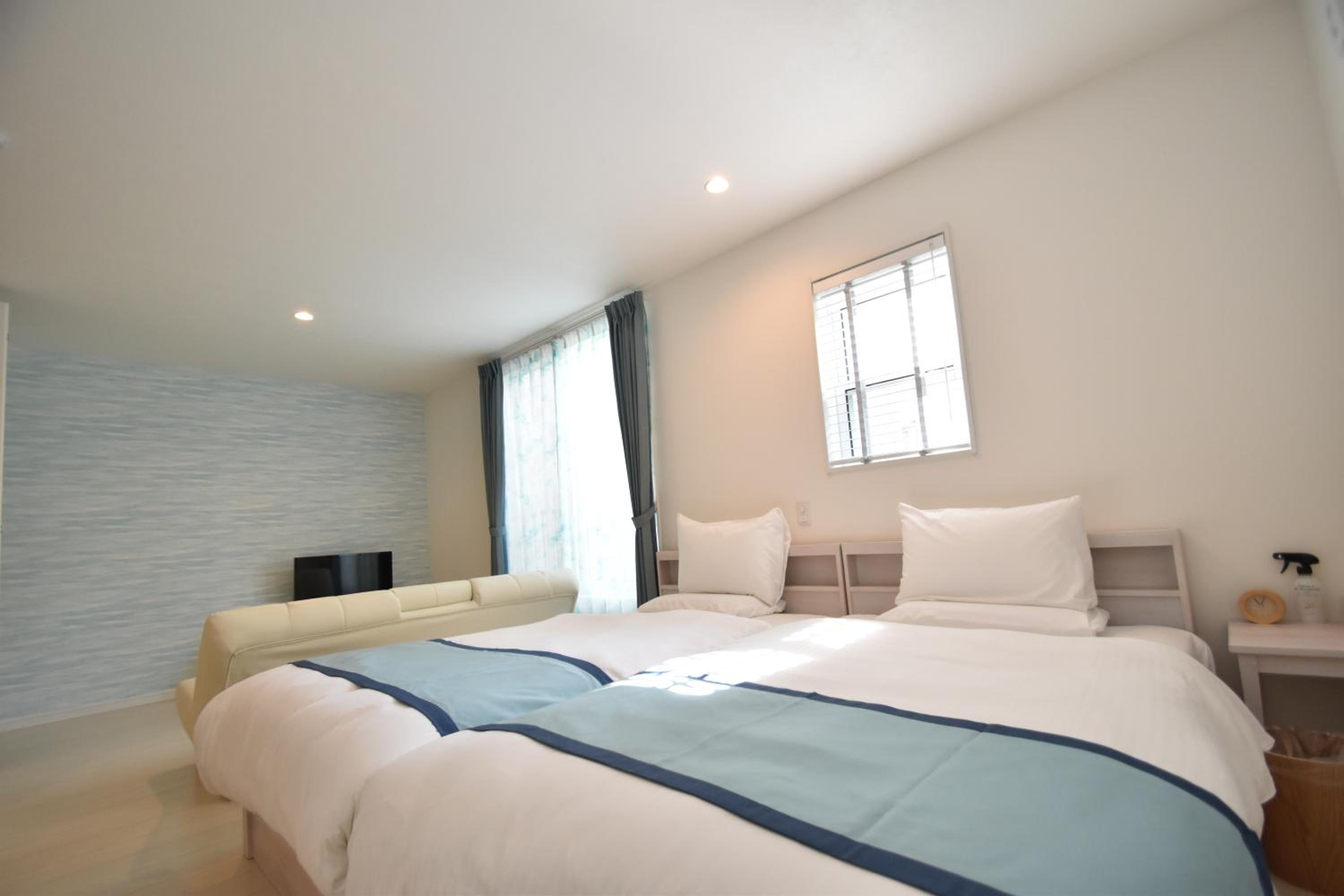 Twin Room with Extra Bed - Photo 20