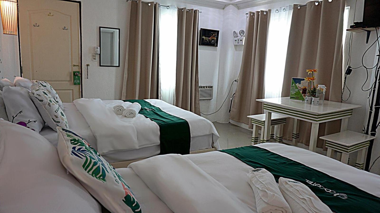 Deluxe Quadruple Room - Photo 13
