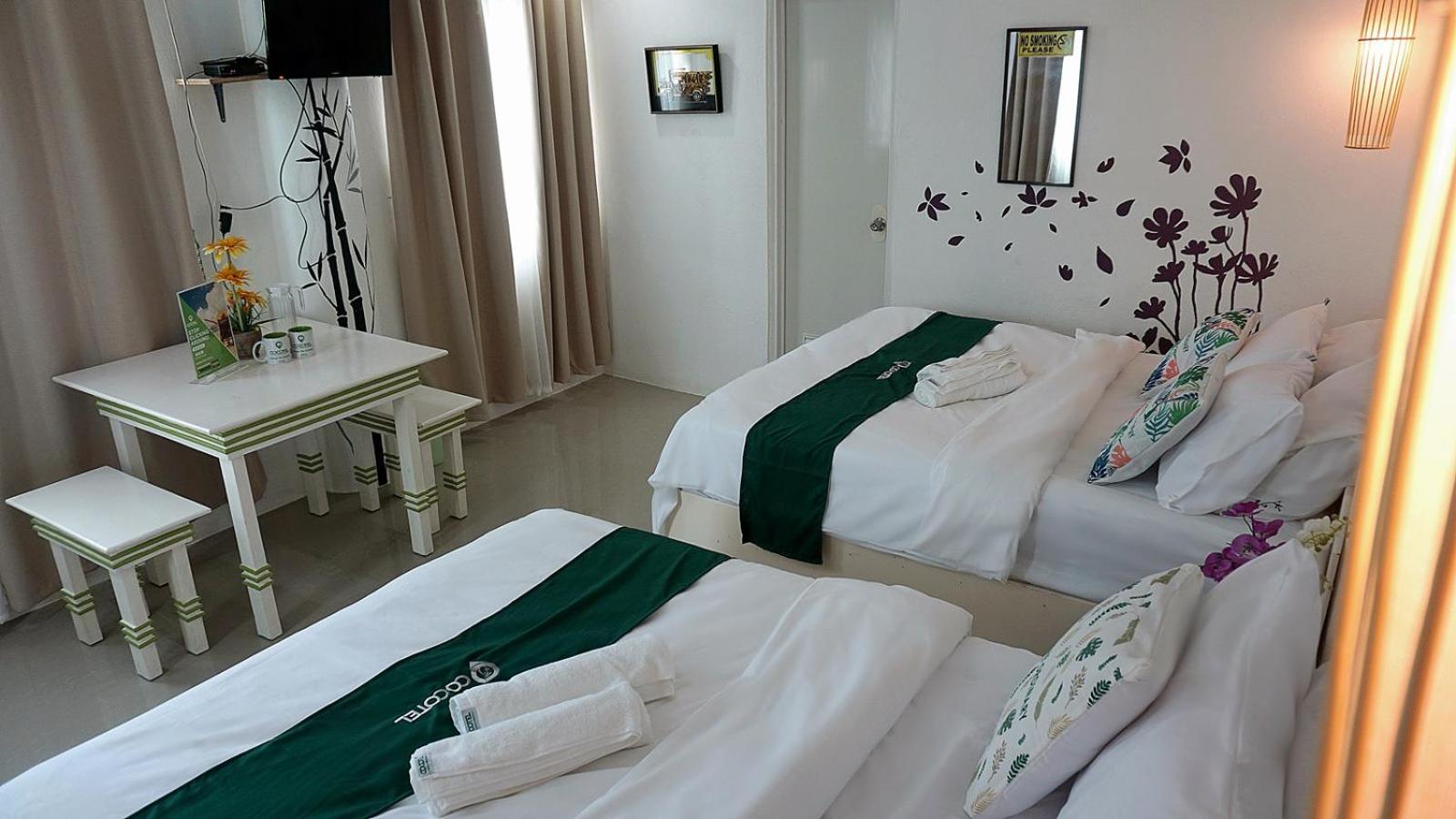 Deluxe Quadruple Room - Photo 15