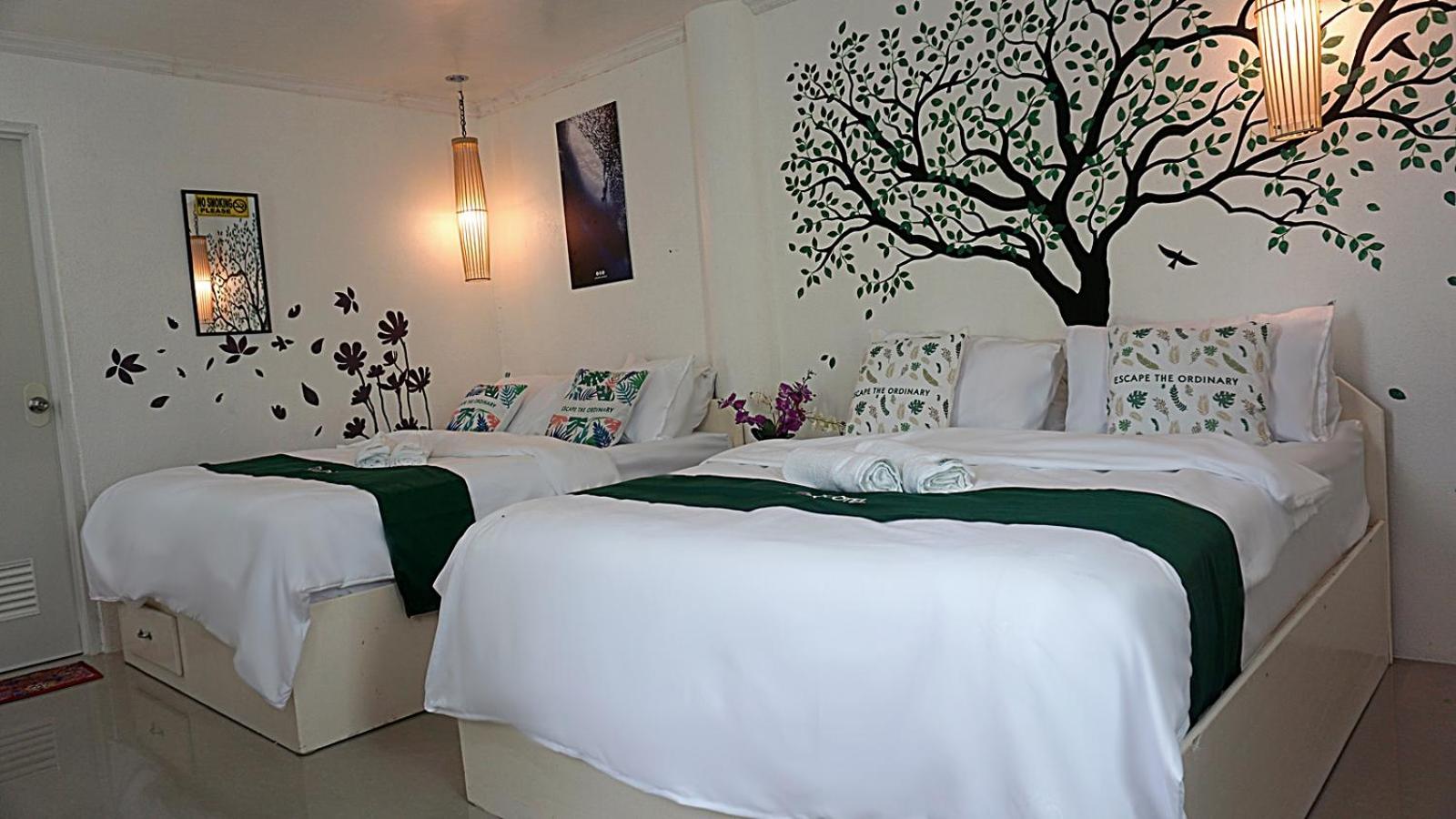Deluxe Quadruple Room - Photo 14