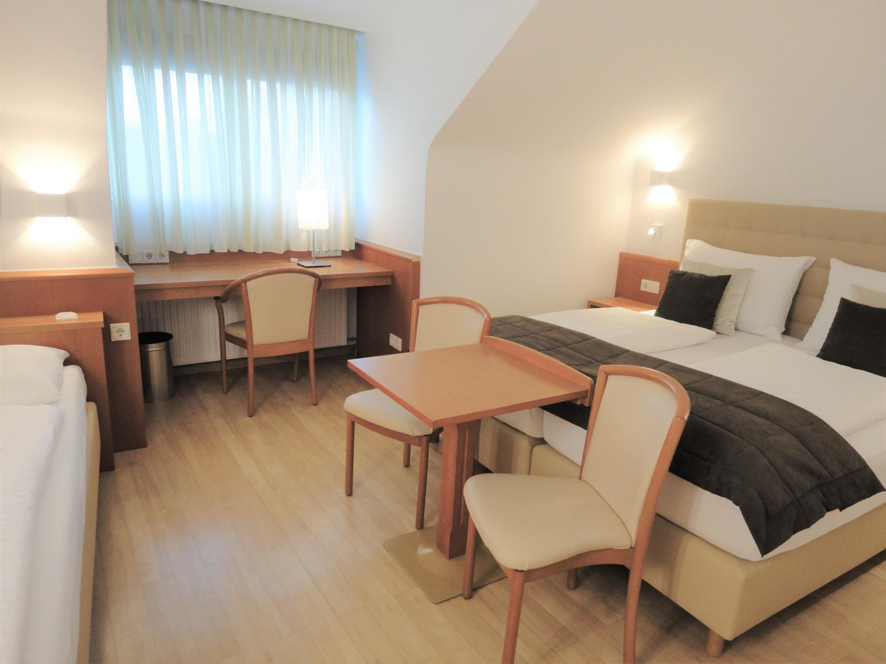 Triple Room - Photo 1