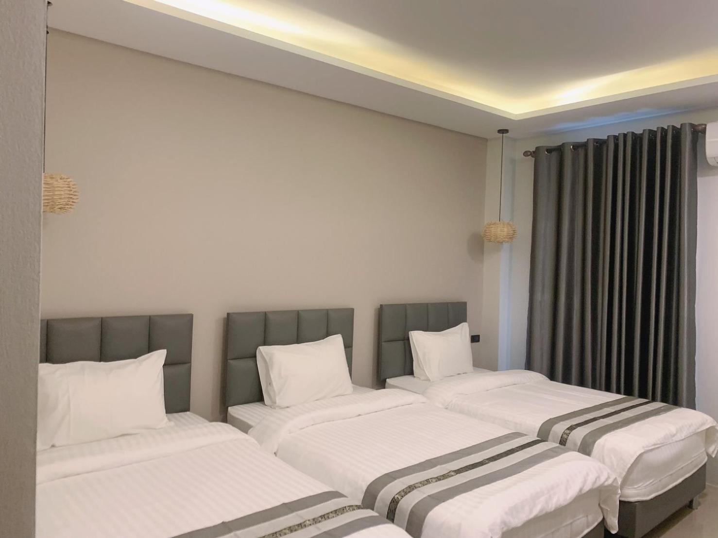 Standard Triple Room - Photo 9