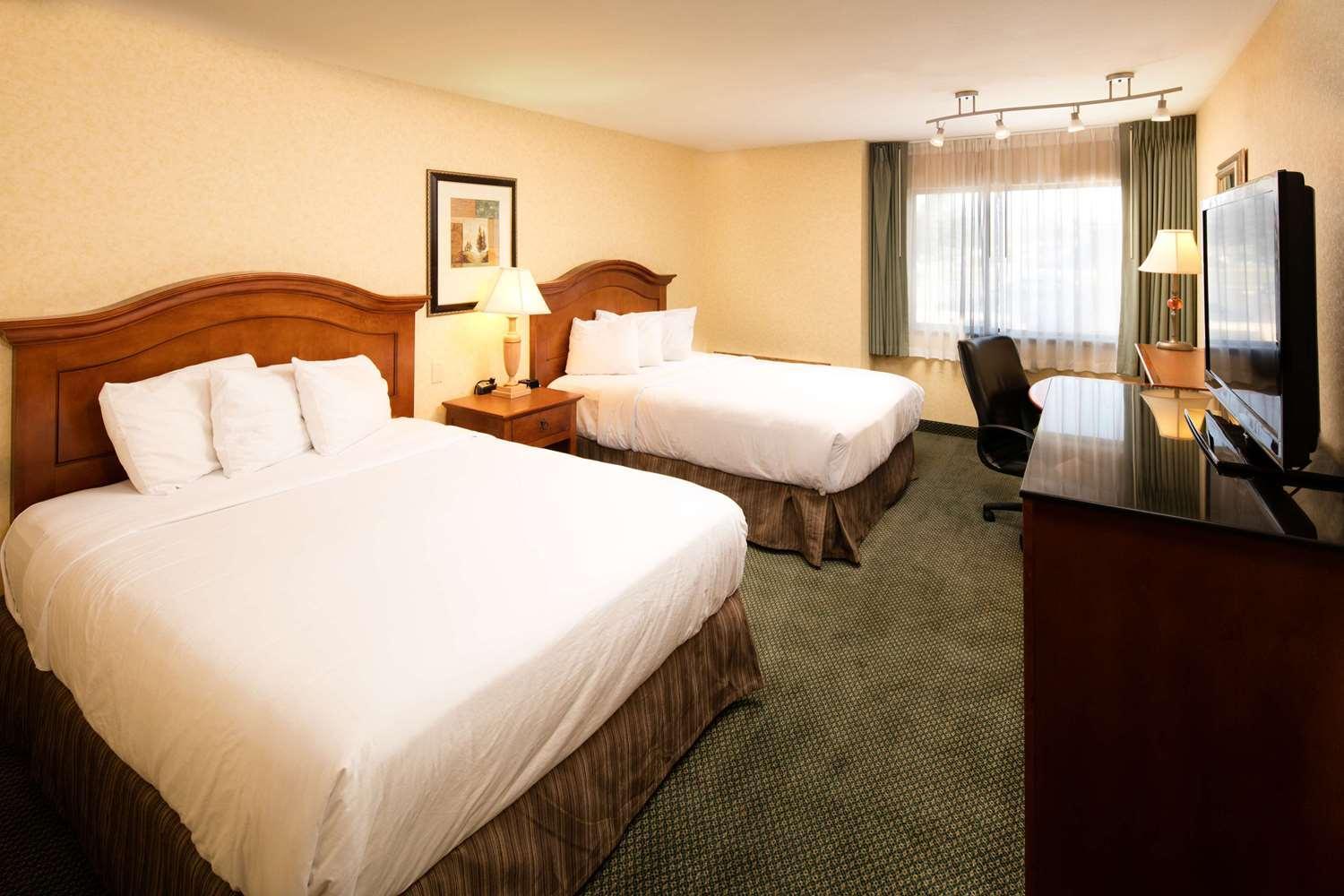 Superior Queen Room with Two Queen Beds - Photo 1