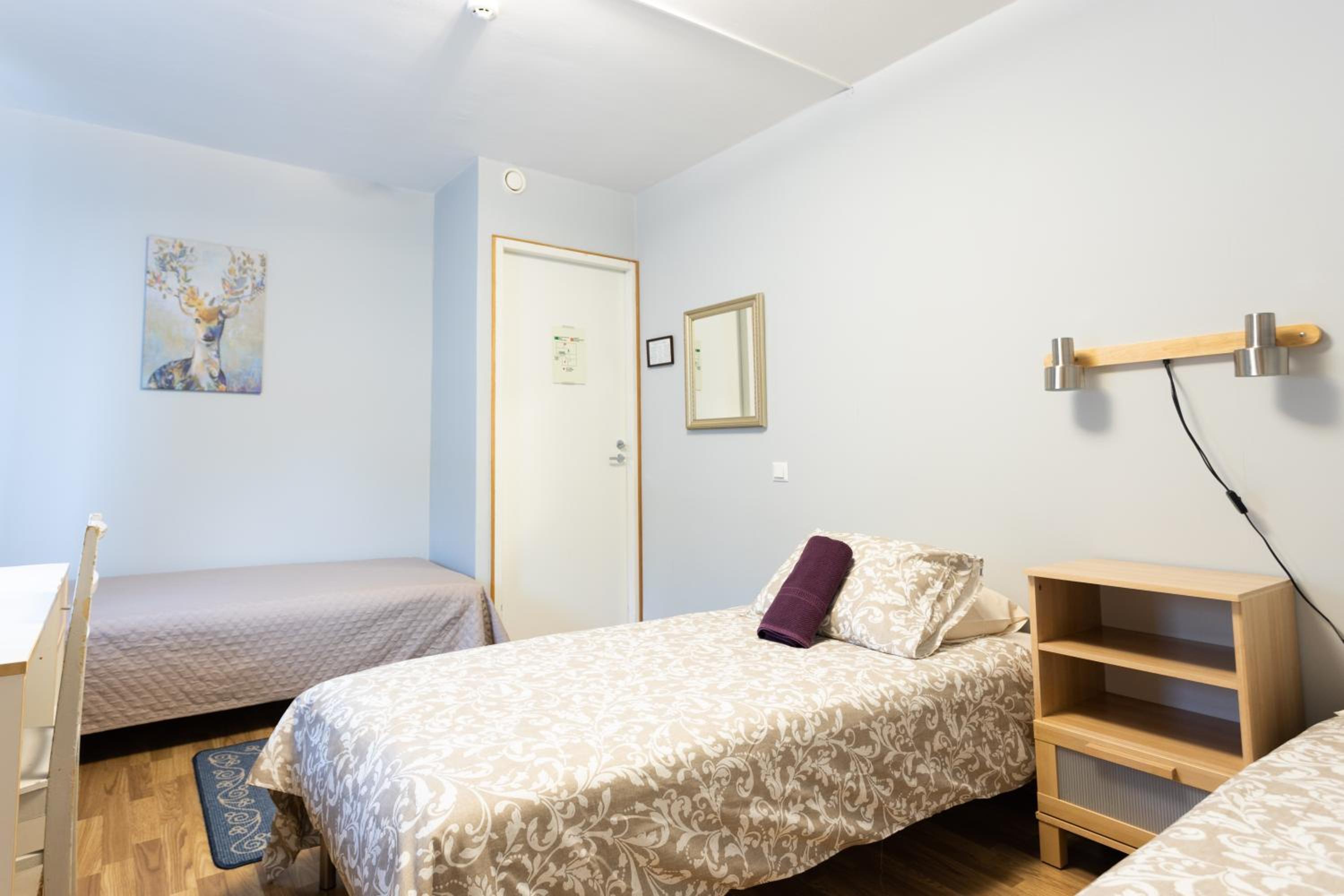 Private Triple Room with Shared Bathroom photo 2