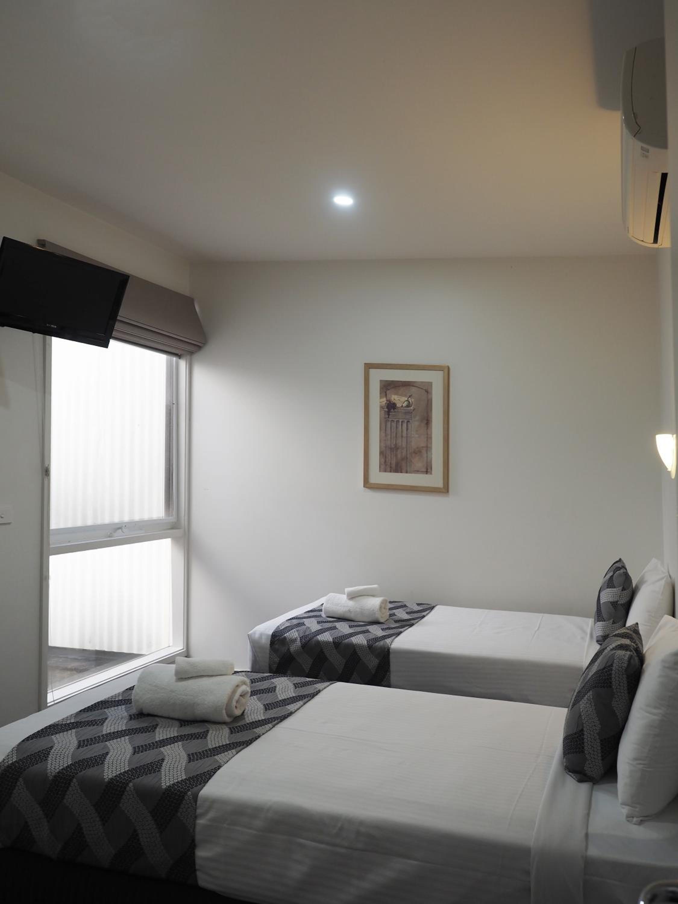 Three-Bedroom Apartment photo 2