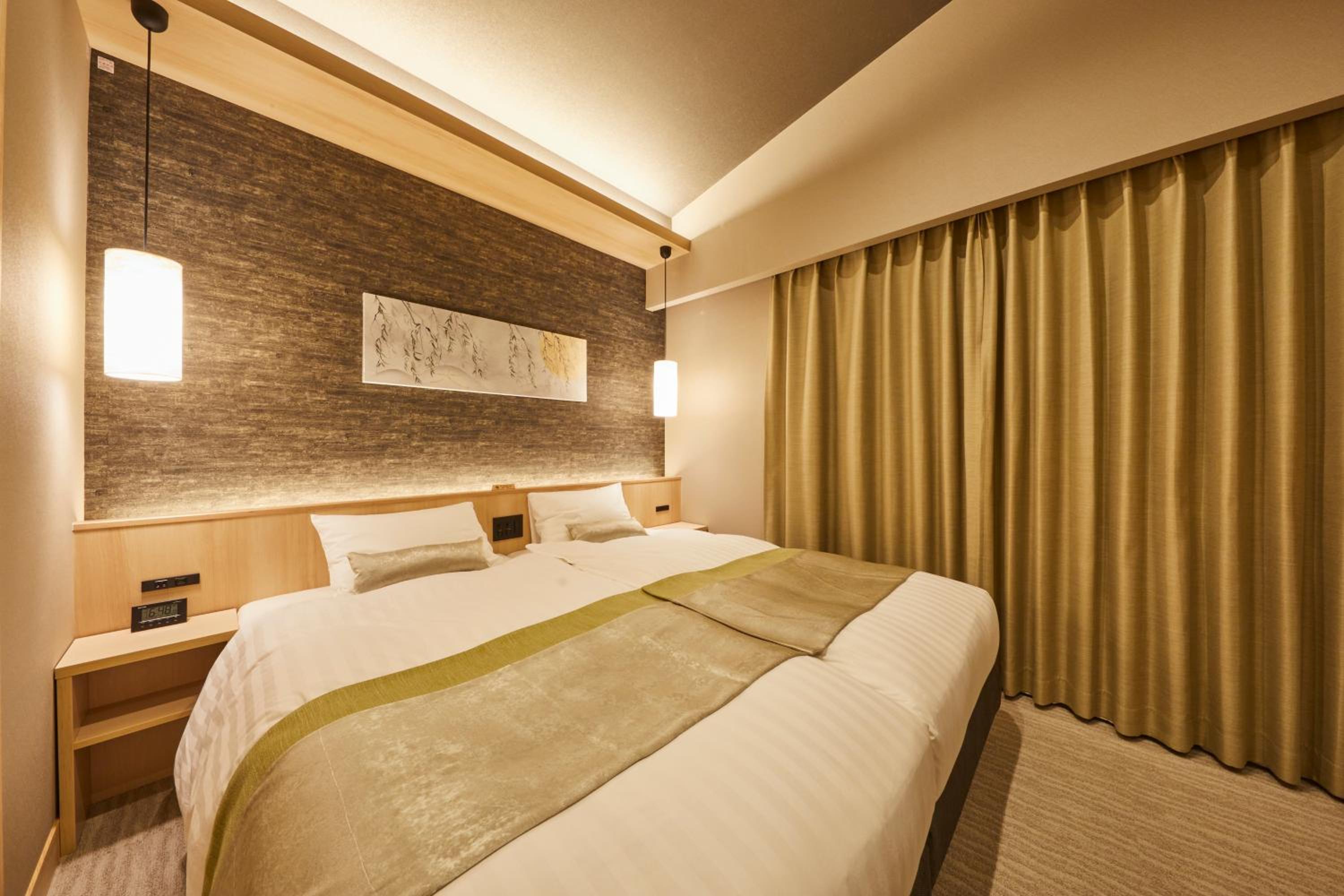Deluxe Twin Room - Photo 11