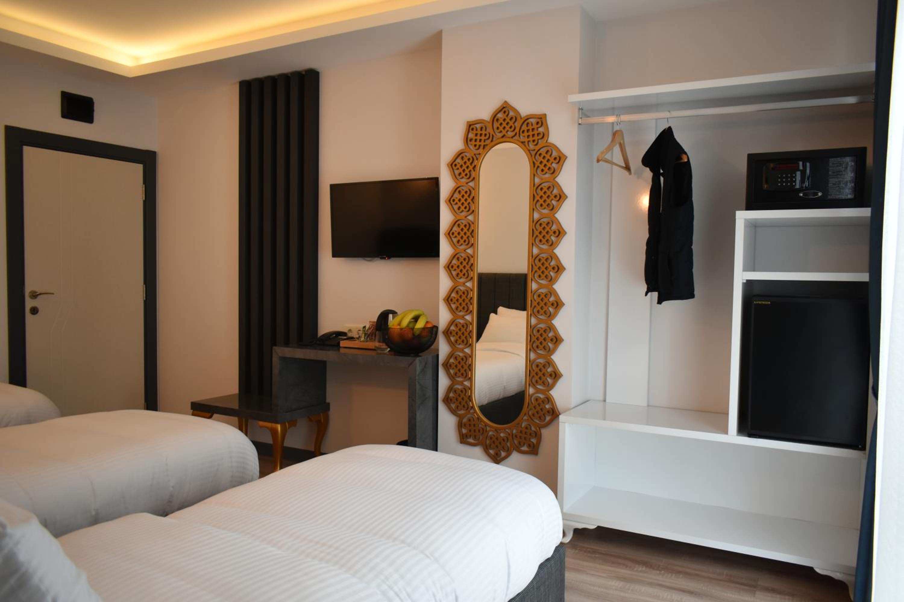 Deluxe Triple Room - Photo 15