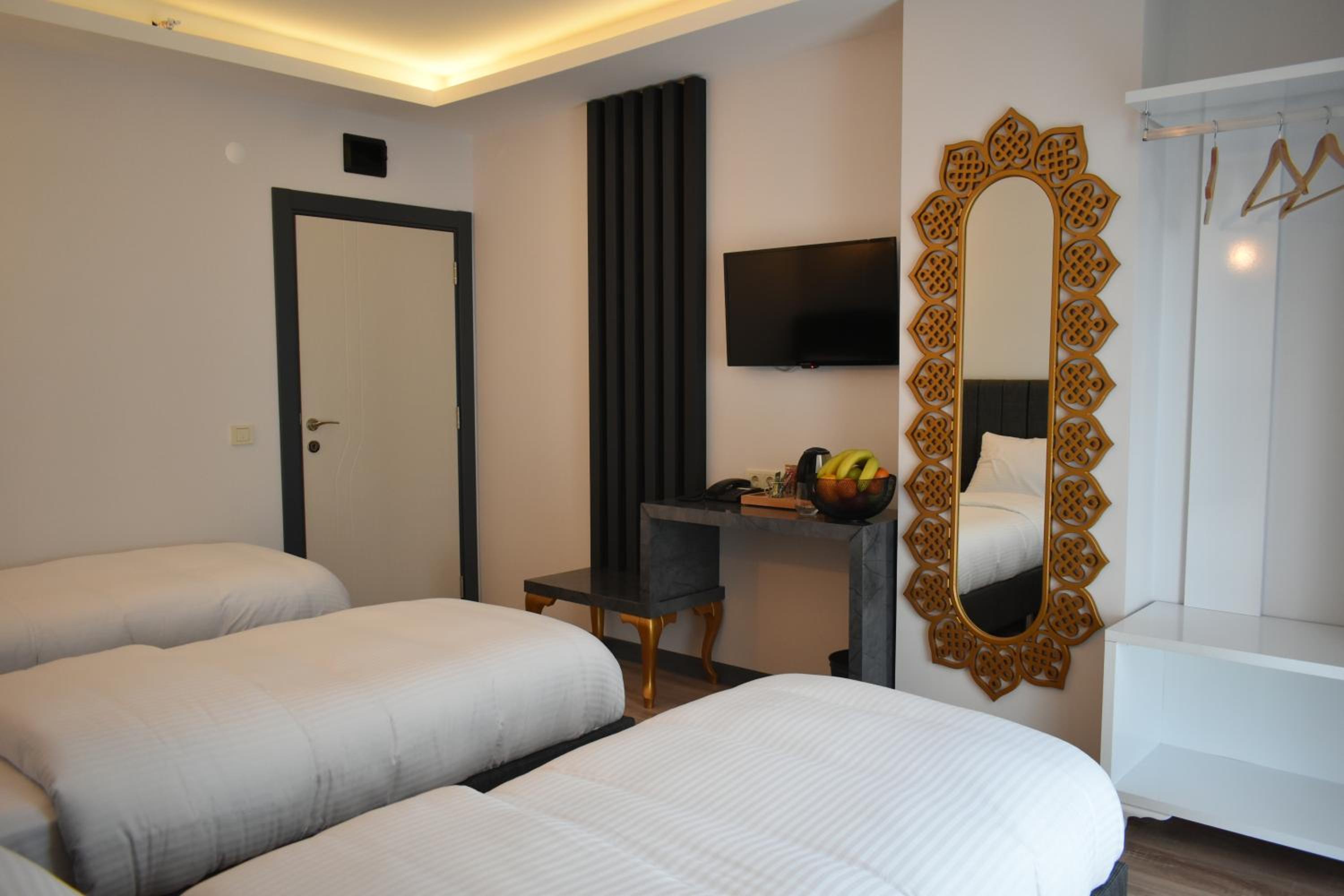 Deluxe Triple Room - Photo 14