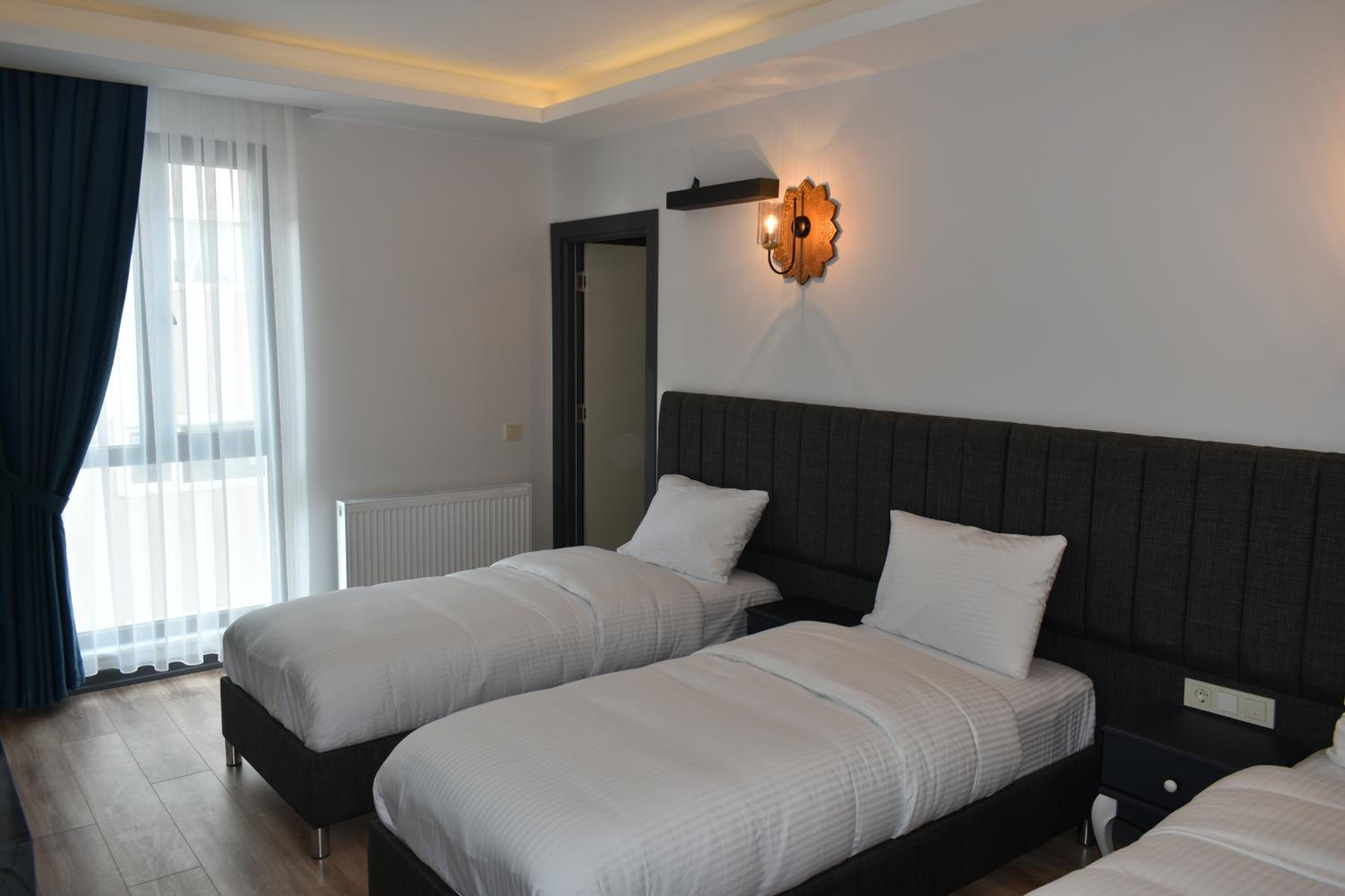 Deluxe Triple Room - Photo 6