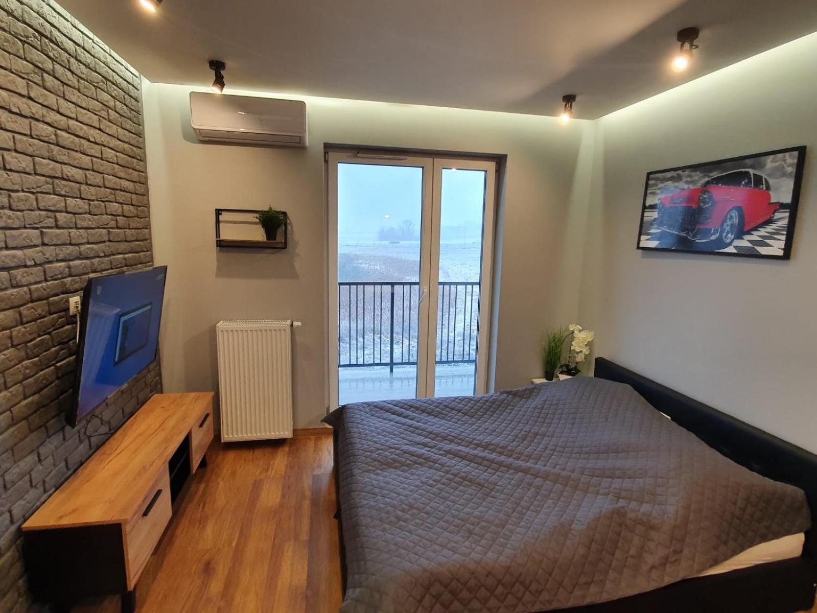 Apartment with Balcony - Photo 3