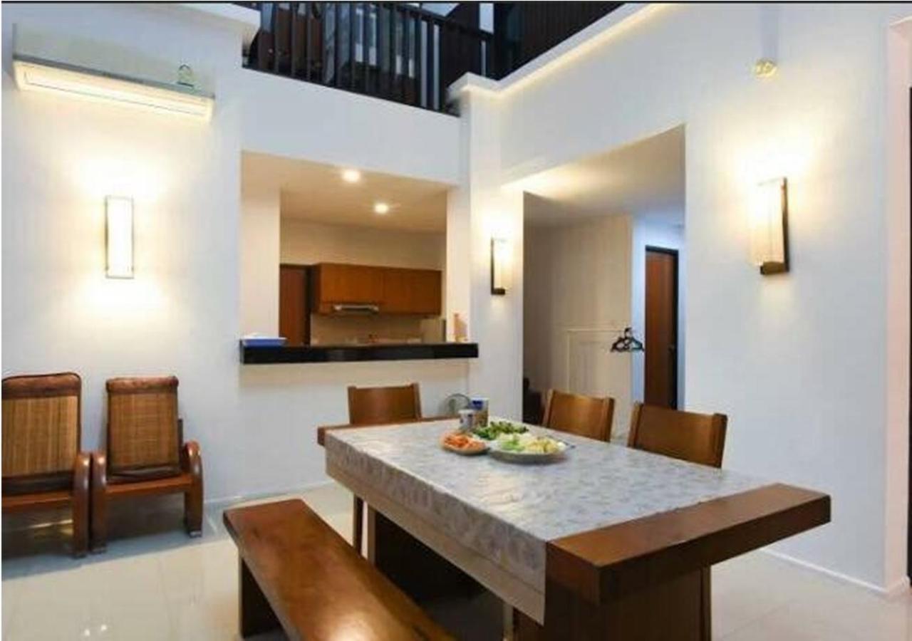 Three-Bedroom House - Photo 4