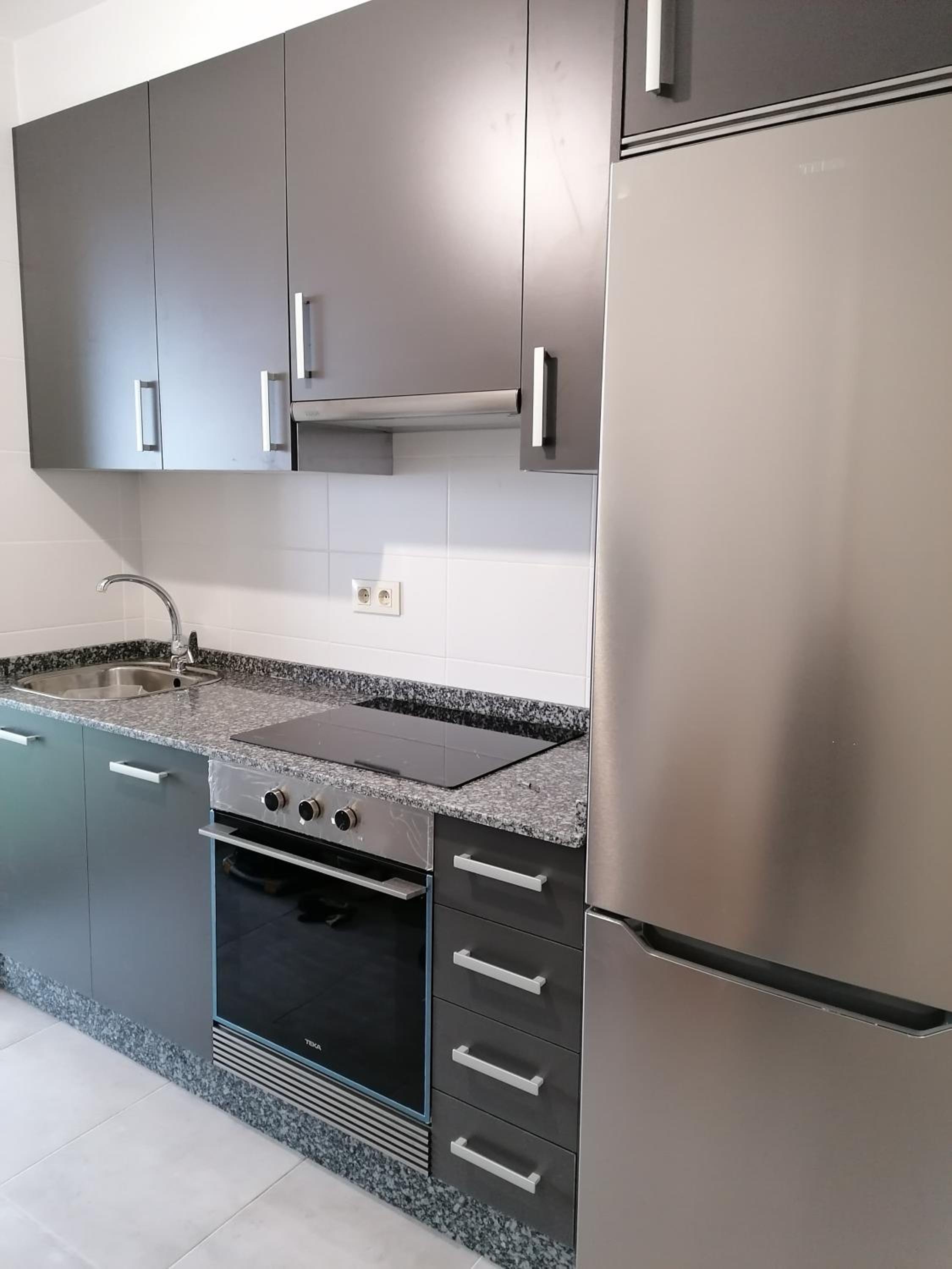 Three-Bedroom Apartment - Photo 19
