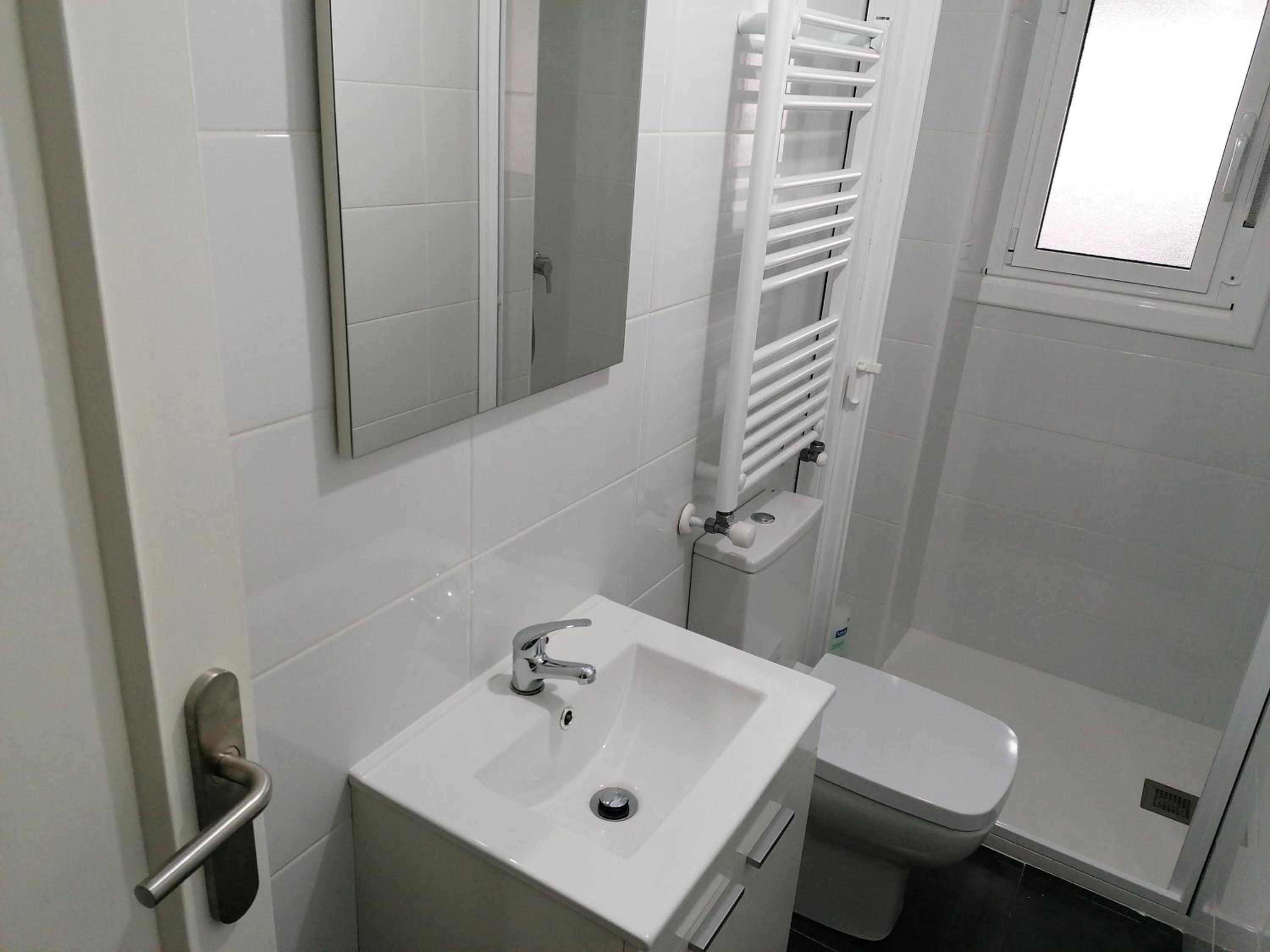 Three-Bedroom Apartment - Photo 2