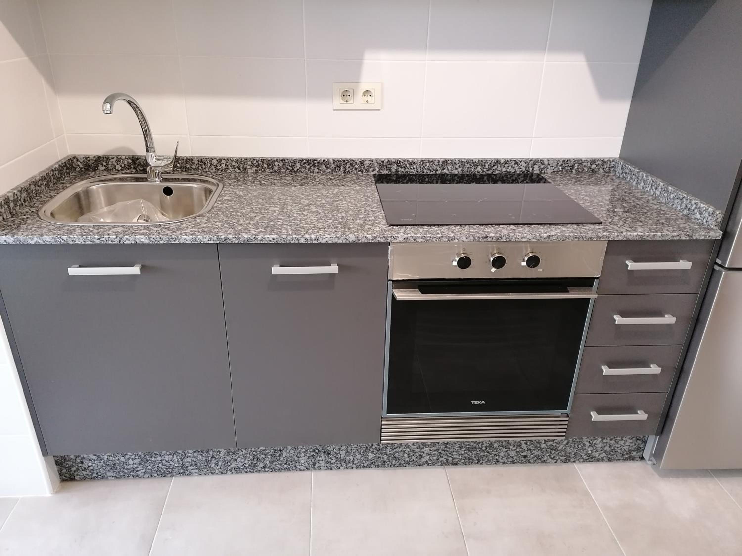 Three-Bedroom Apartment - Photo 30