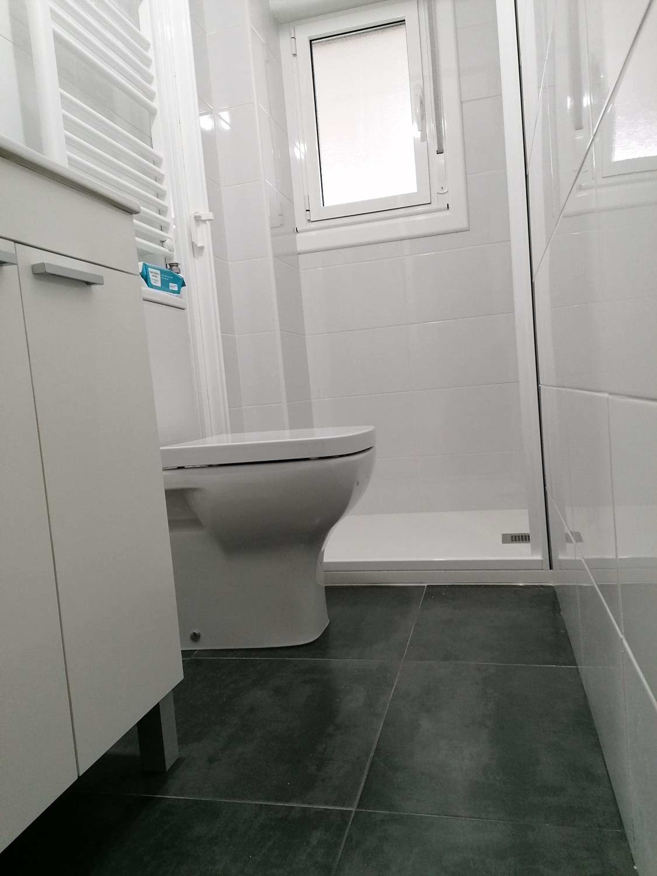 Three-Bedroom Apartment - Photo 32