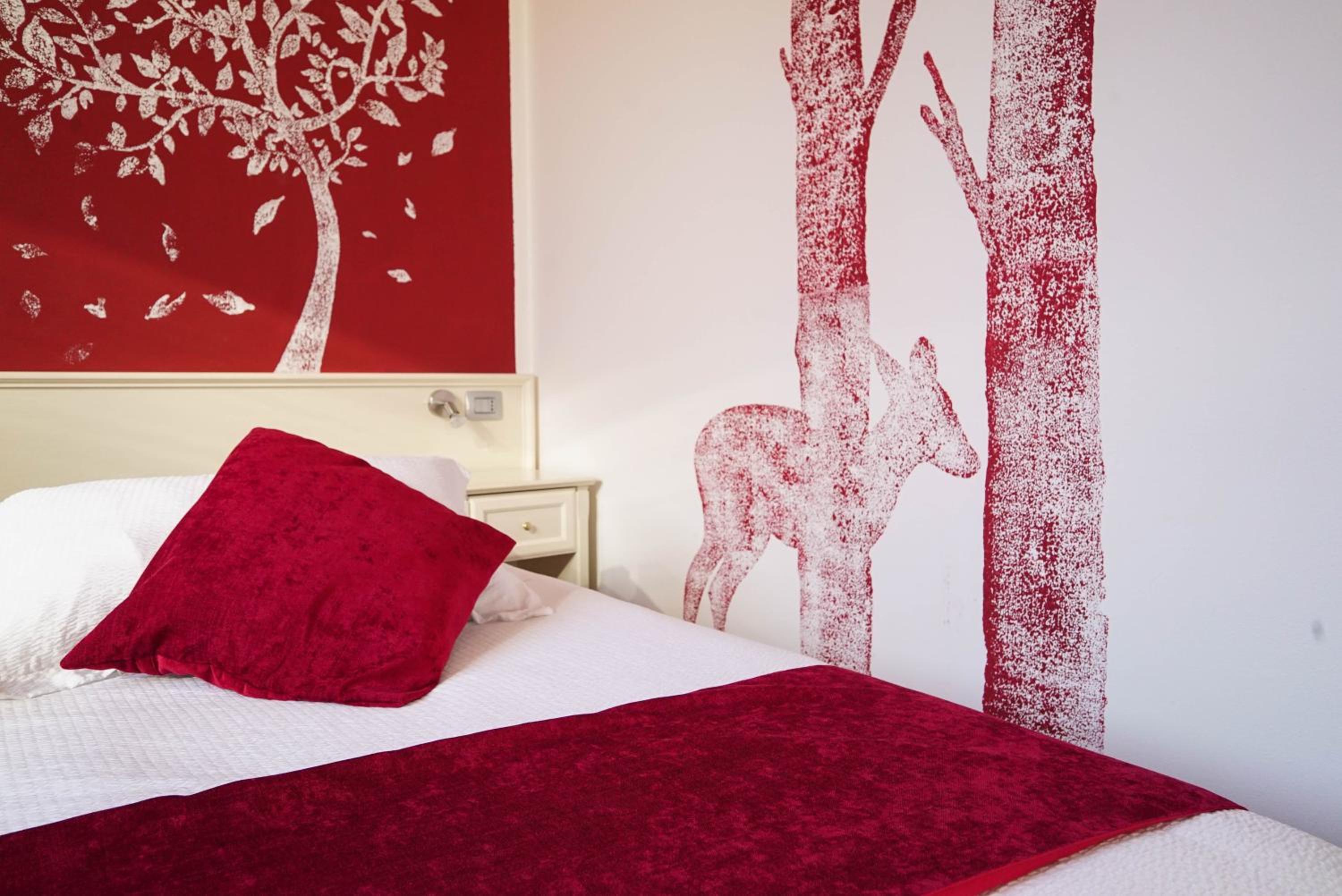 Deluxe Triple Room - Photo 12