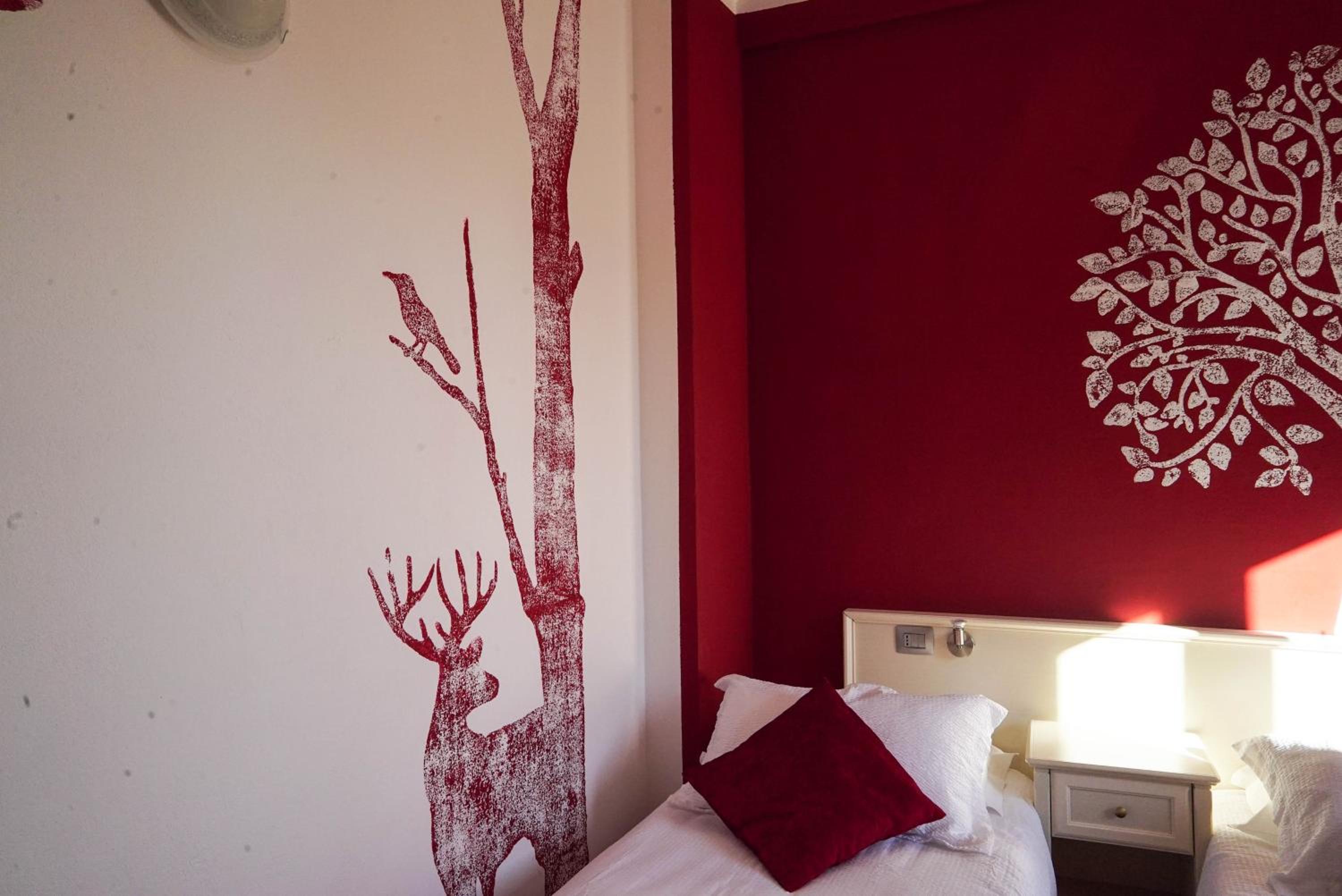 Deluxe Triple Room - Photo 11