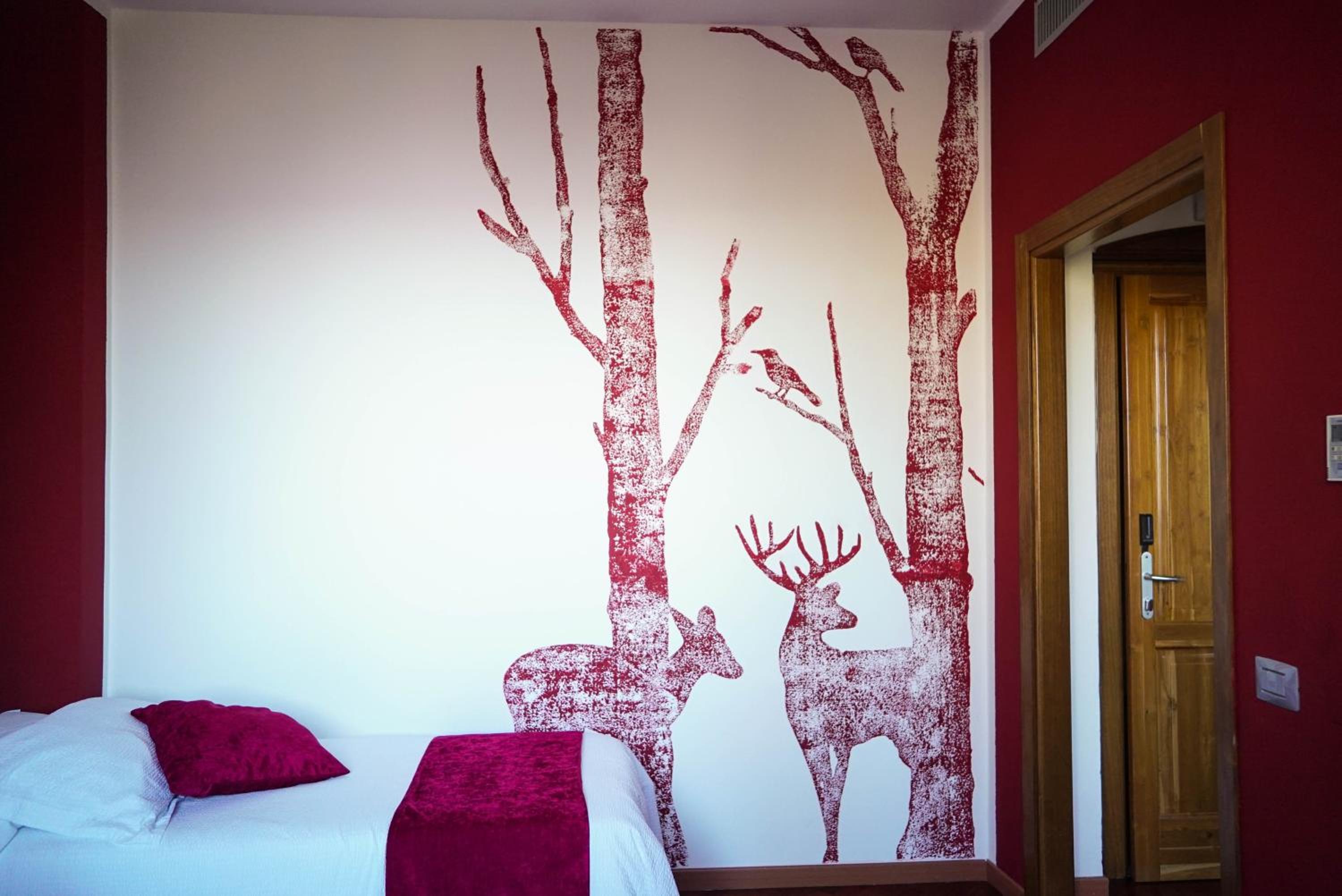 Deluxe Triple Room - Photo 9