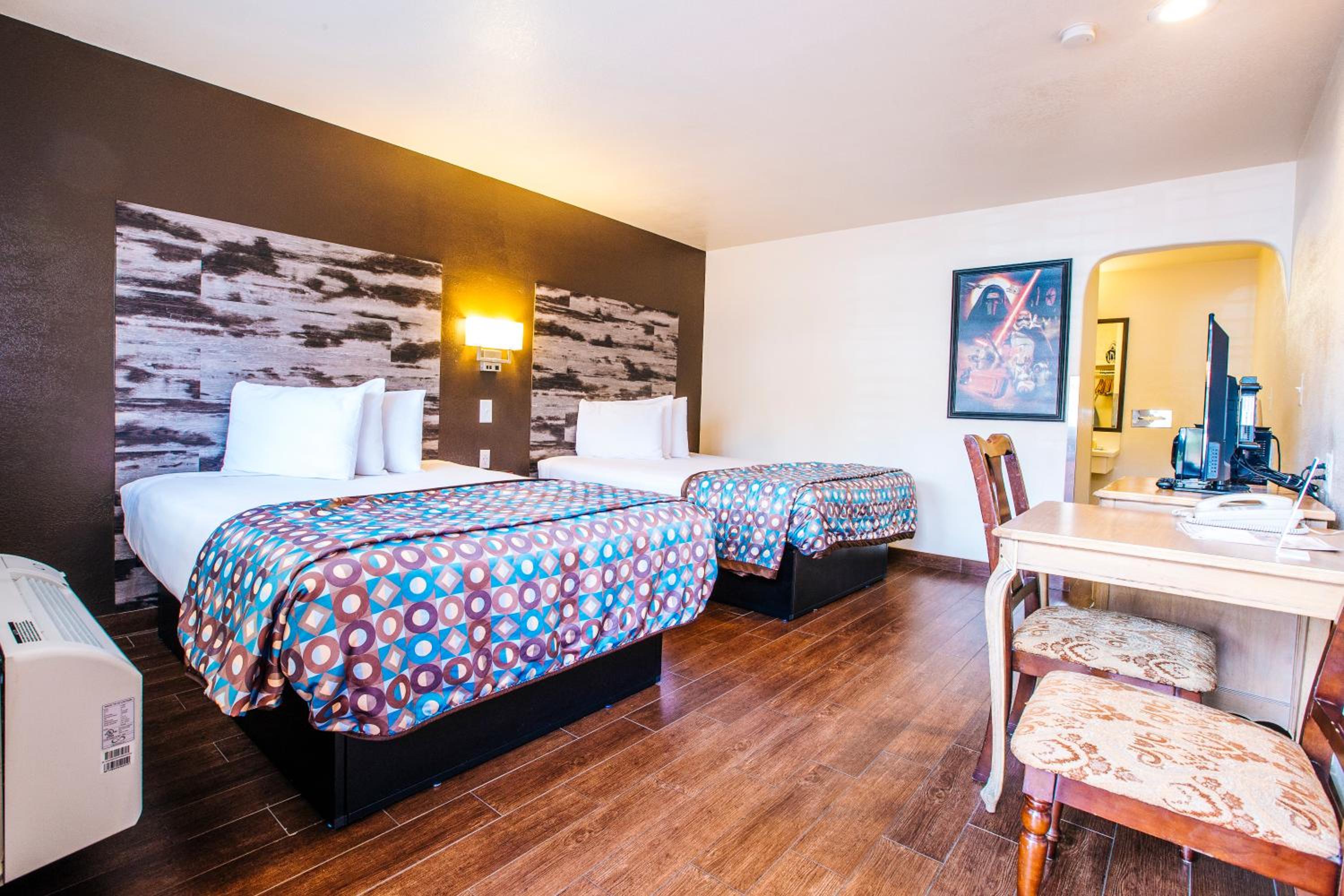 Standard Queen Room with Two Queen Beds - Photo 13