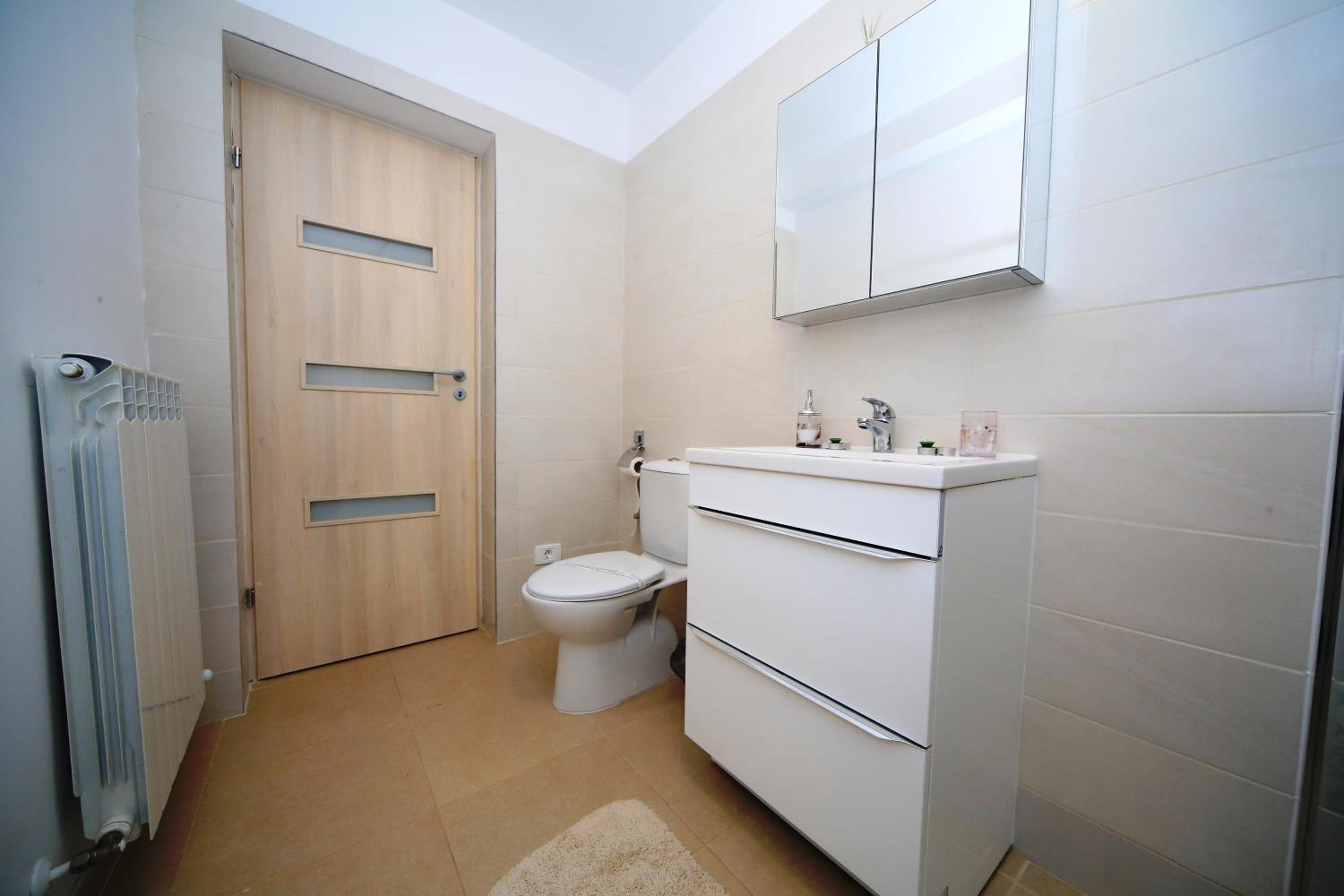 Three-Bedroom House - Photo 23