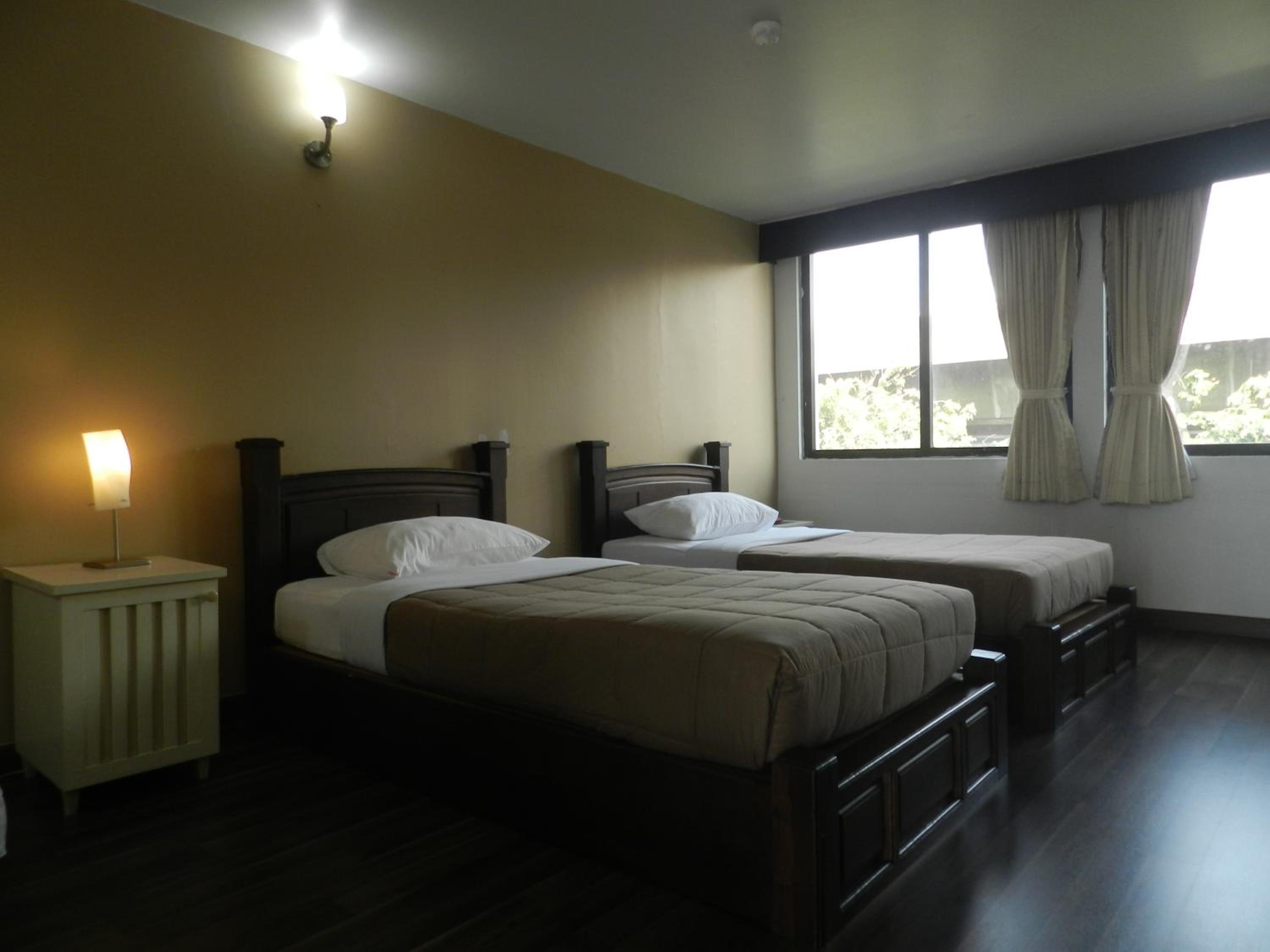 Standard Queen Room with Two Queen Beds photo 3