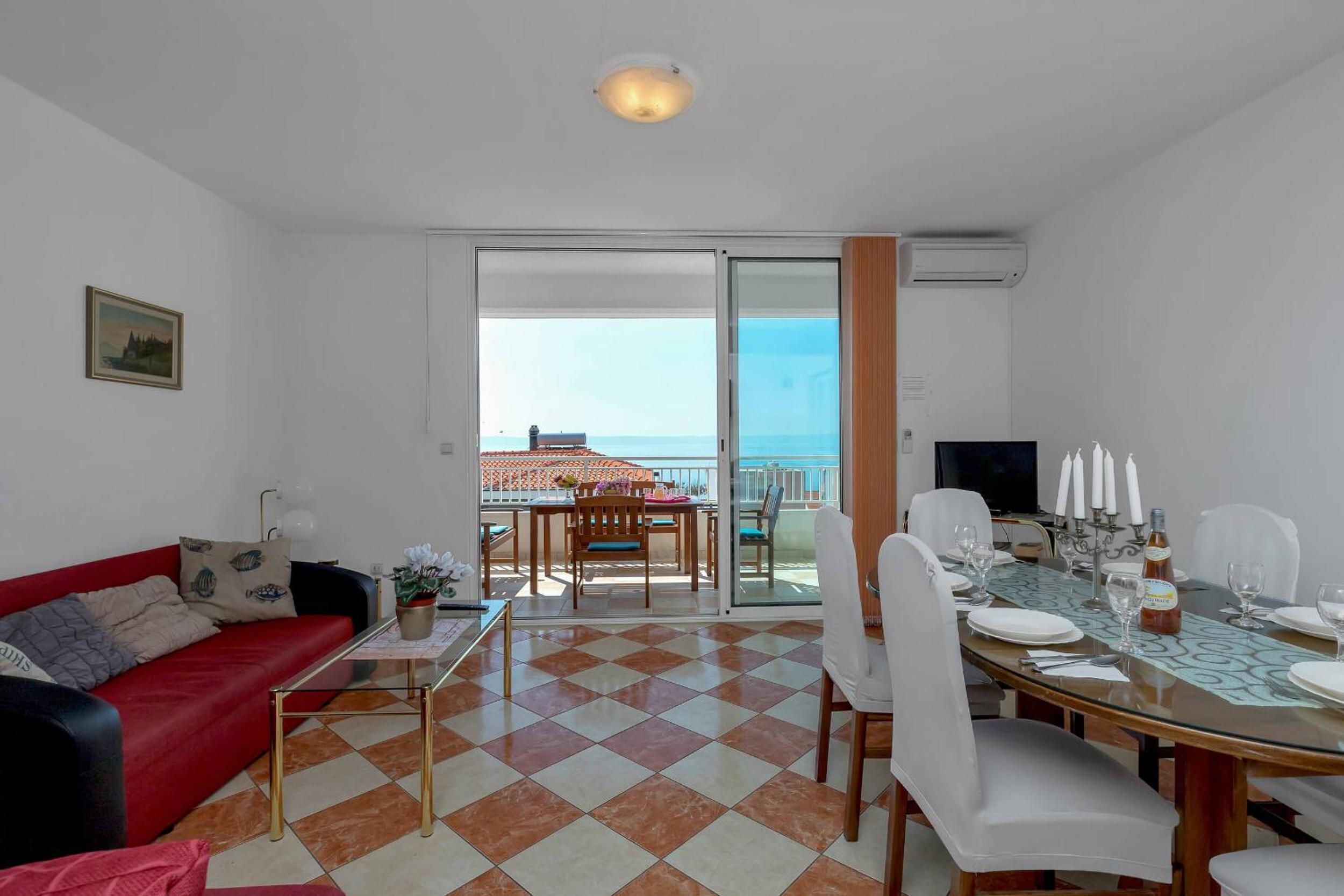 Duplex Three-Bedroom Apartment with Terraces and Sea View