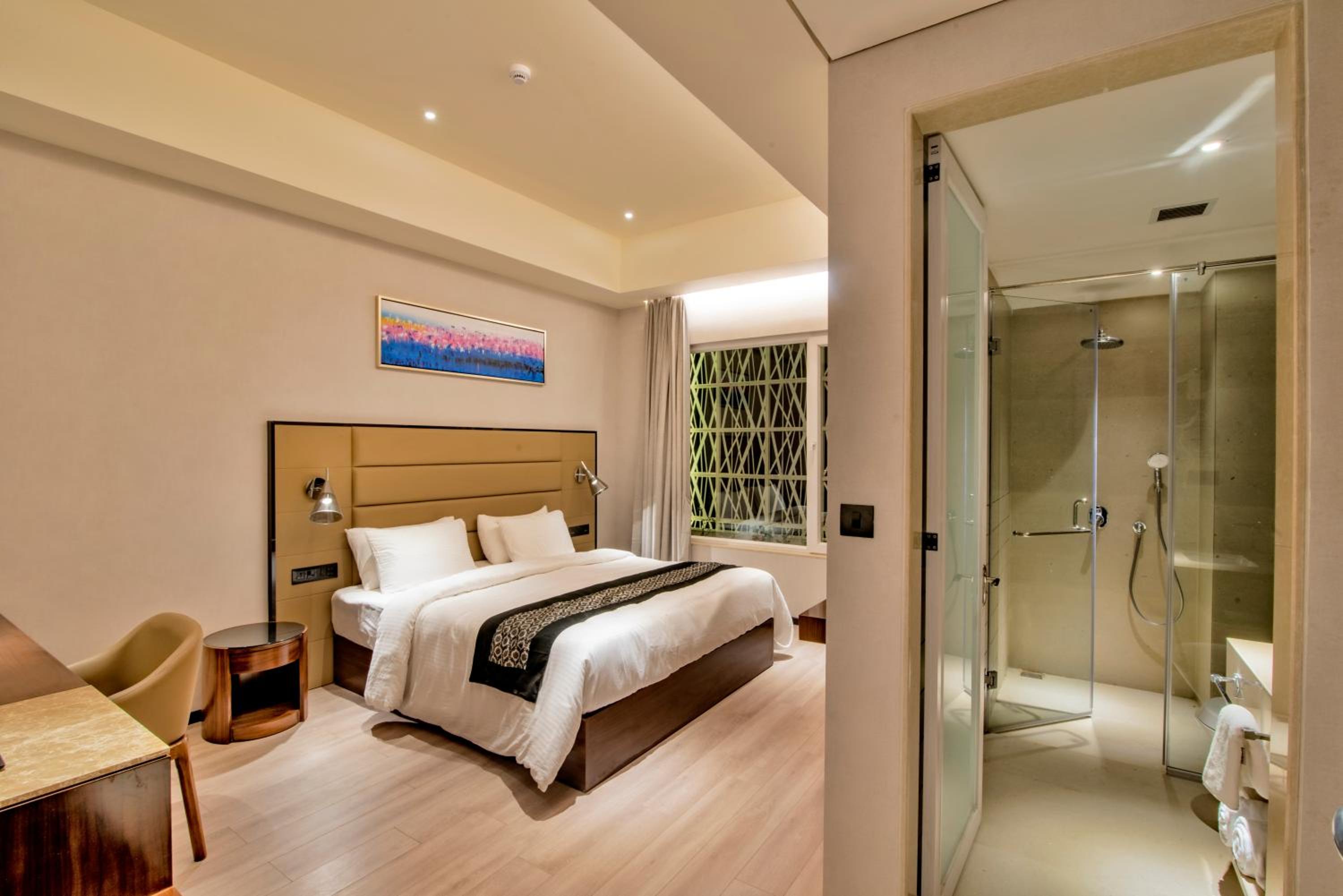 Deluxe Room - Photo 6