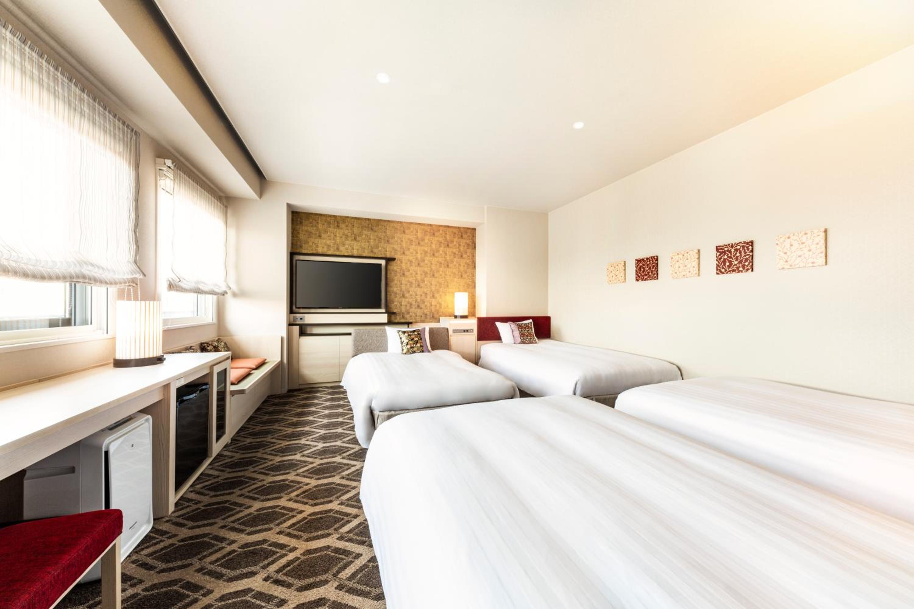 Triple Room (4 Adults) - Non-Smoking photo 1
