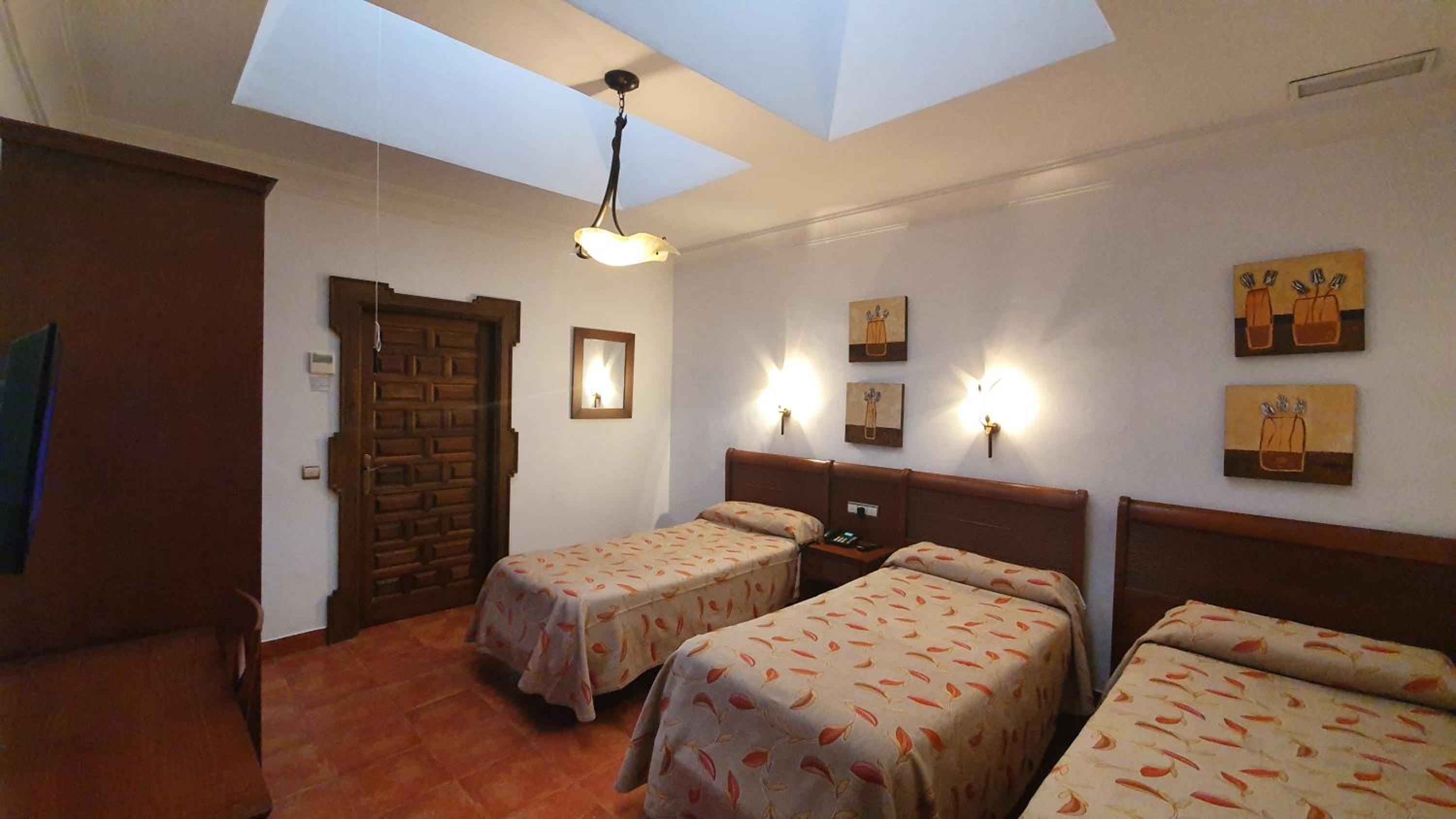 Habitación Triple con Baño Privado
