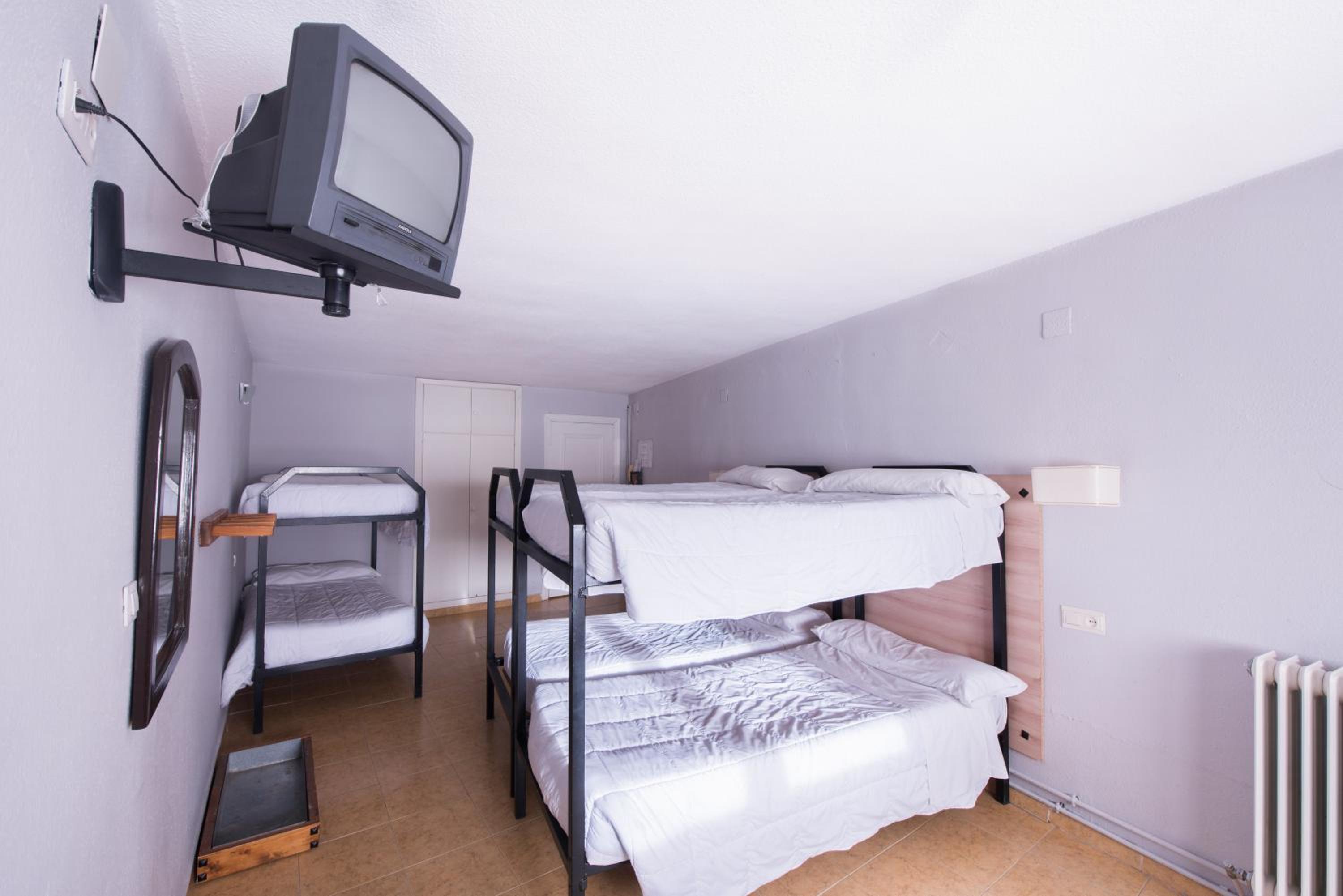 Habitación Cuádruple (2 Adultos + 2 Niños)